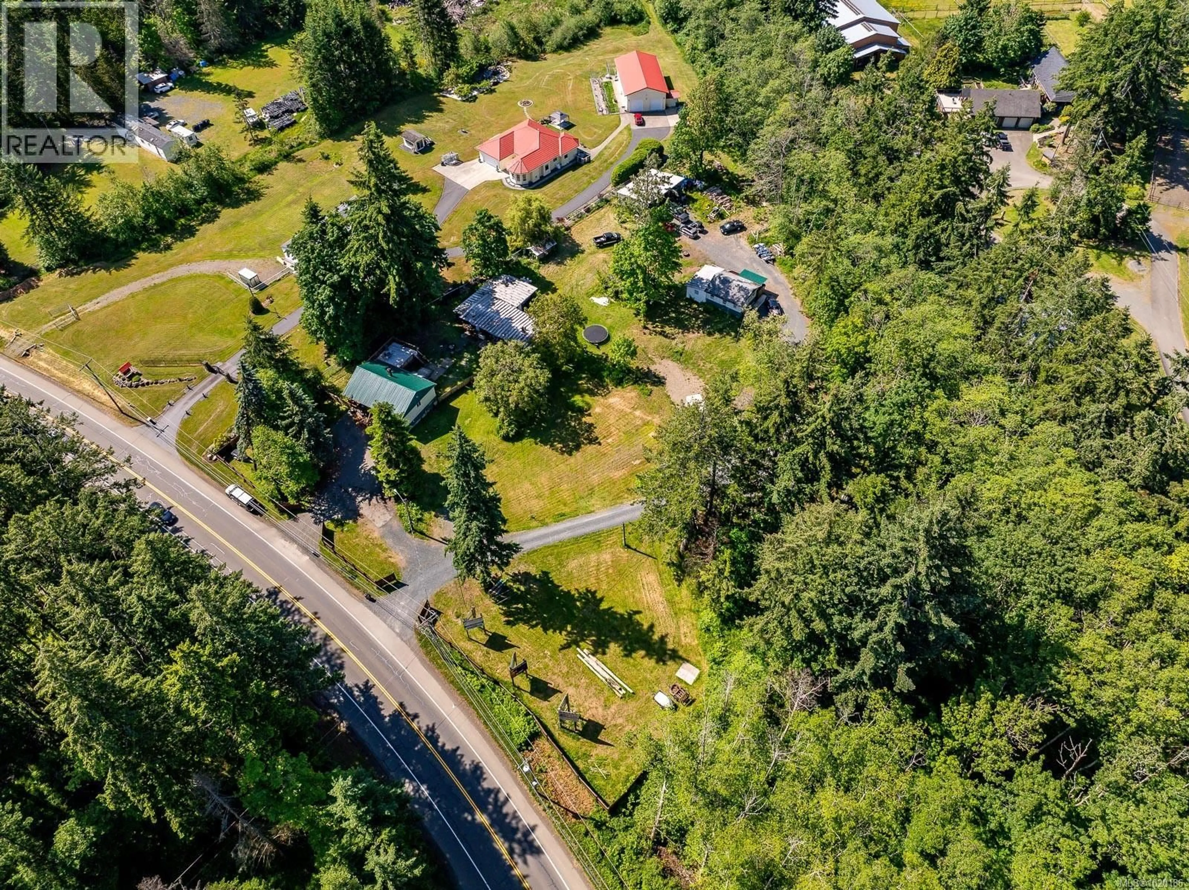 A pic from outside/outdoor area/front of a property/back of a property/a pic from drone, unknown for 4399 ISLAND HIGHWAY SOUTH, Courtenay British Columbia V9N9T1