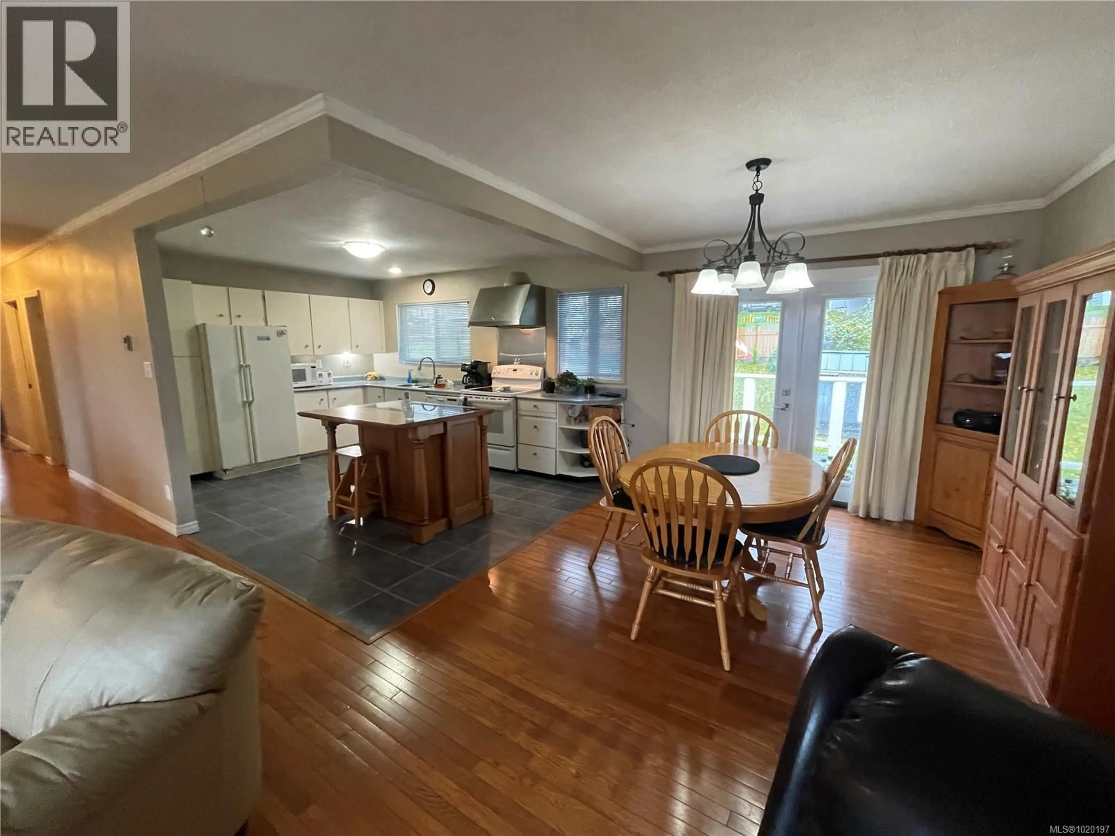 Open concept kitchen, wood/laminate floor for 965 HAIDA AVENUE, Port Alice British Columbia V0N2N0