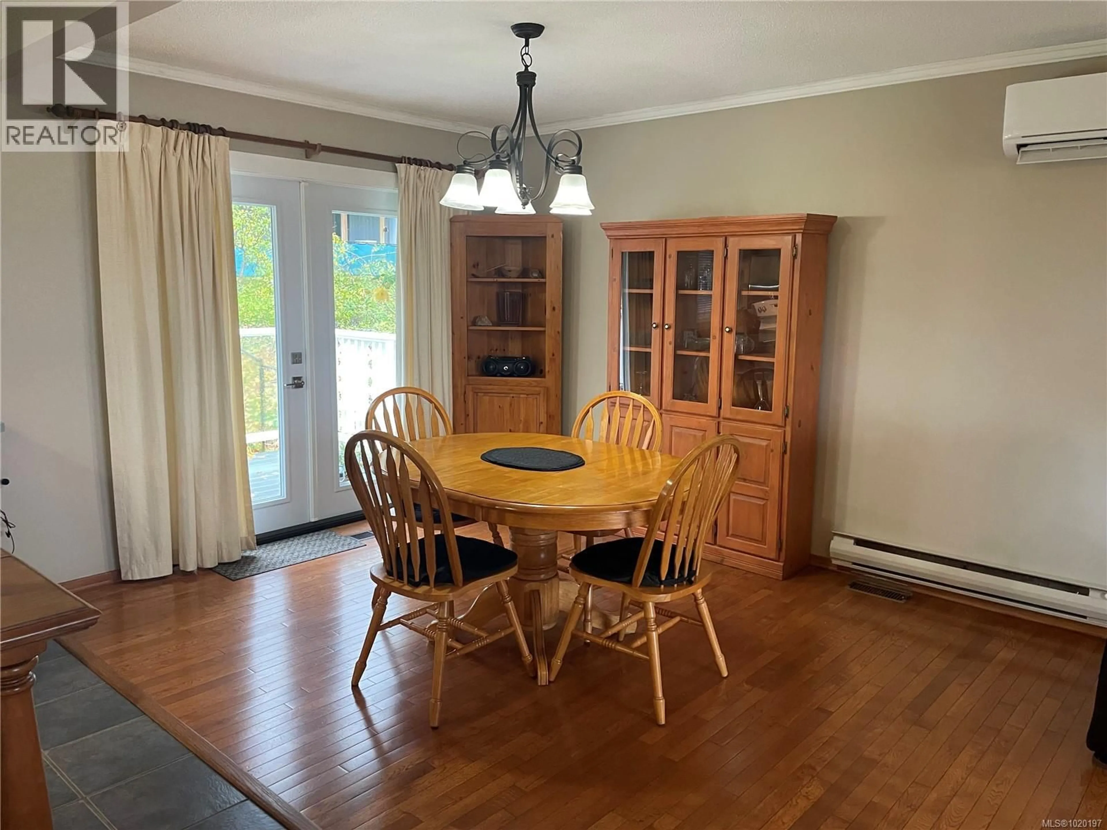 Dining room, wood/laminate floor for 965 HAIDA AVENUE, Port Alice British Columbia V0N2N0