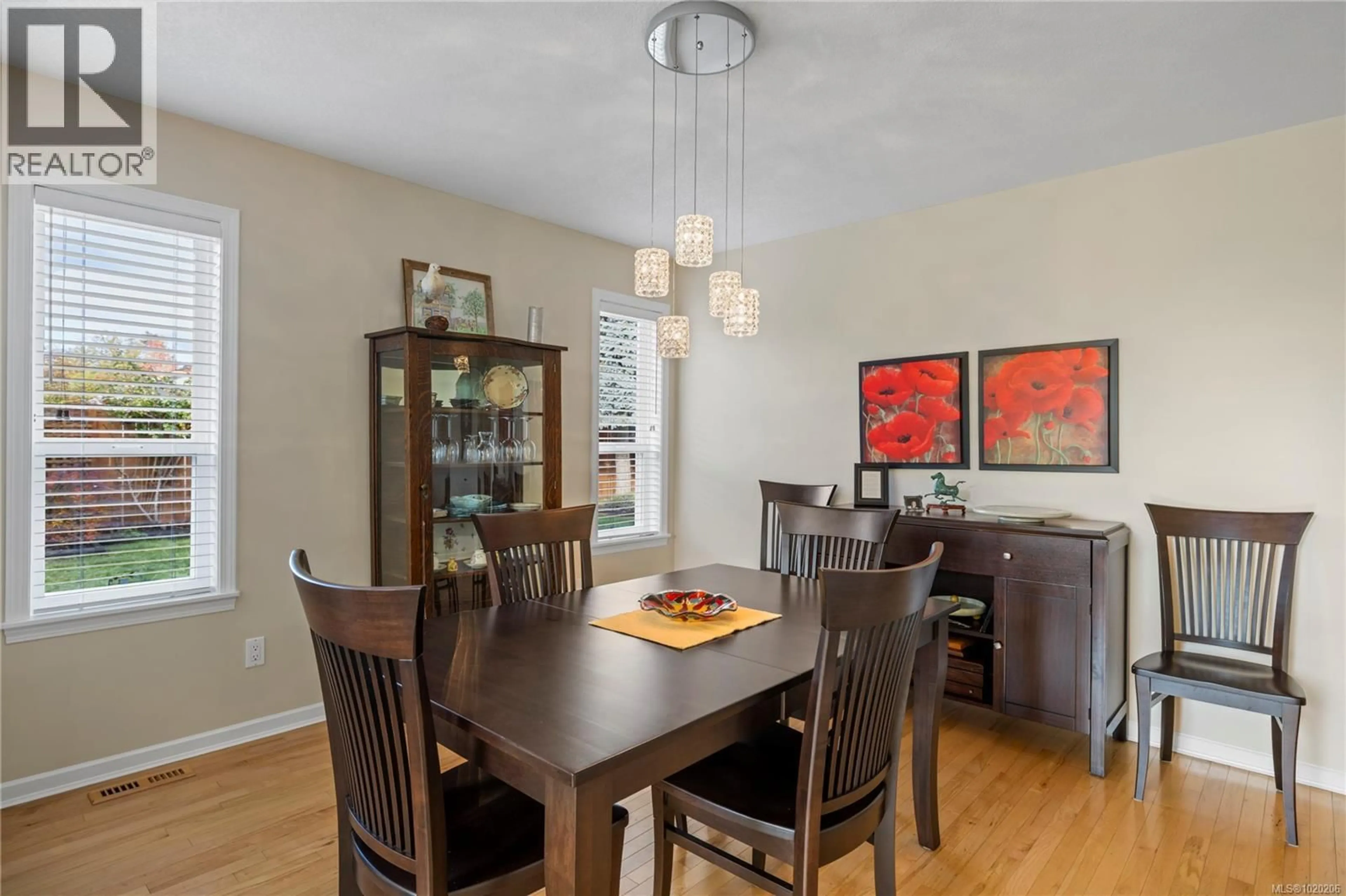 Dining room, wood/laminate floor for 201 CRABAPPLE CRESCENT, Parksville British Columbia V9P2P7