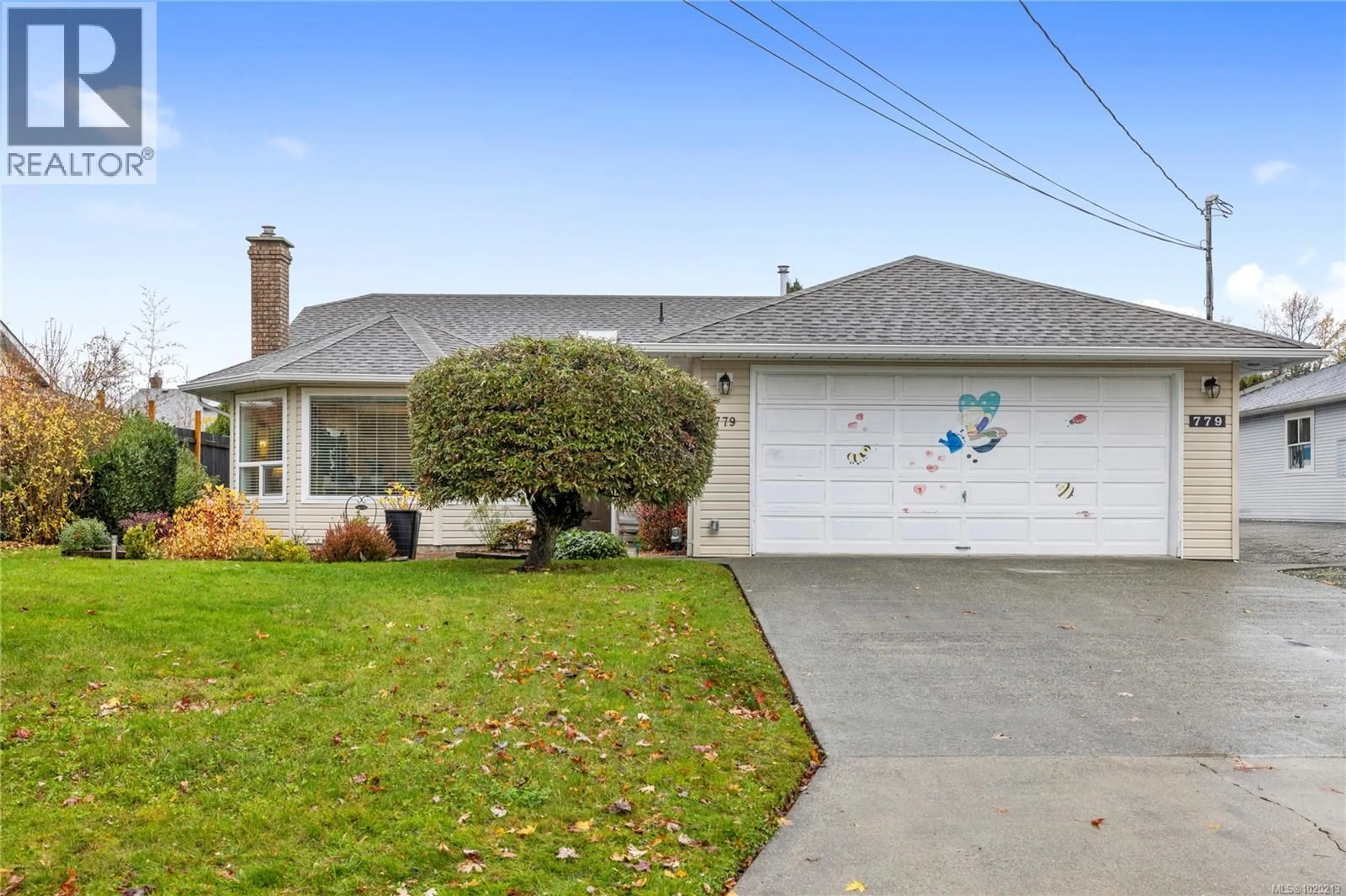 Home with vinyl exterior material, street for 779 DAFFODIL DRIVE, Parksville British Columbia V9P1E3