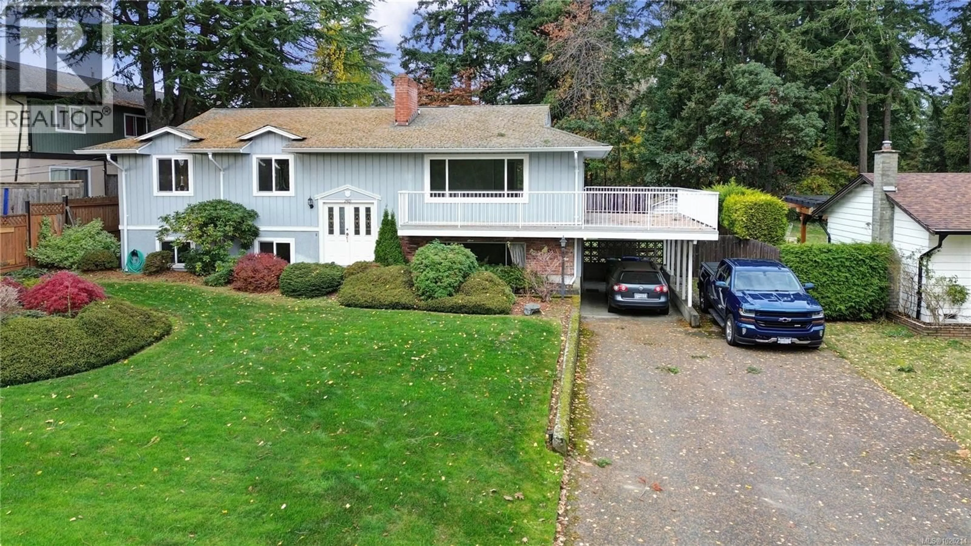 A pic from outside/outdoor area/front of a property/back of a property/a pic from drone, street for 2401 COSGROVE CRESCENT, Nanaimo British Columbia V9S3N9
