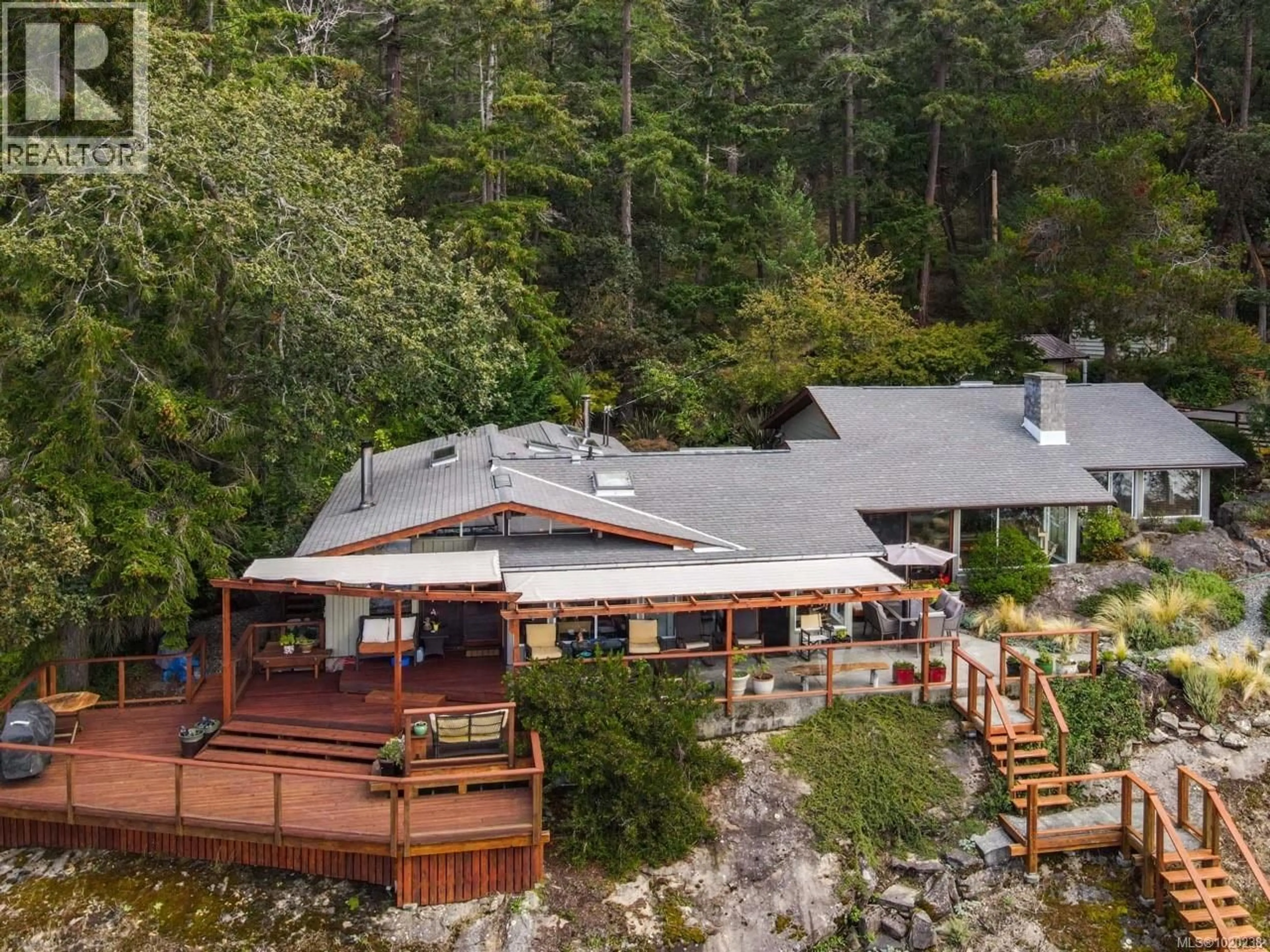 A pic from outside/outdoor area/front of a property/back of a property/a pic from drone, water/lake/river/ocean view for 214 DOGWOOD LANE, Salt Spring British Columbia V8K1A4