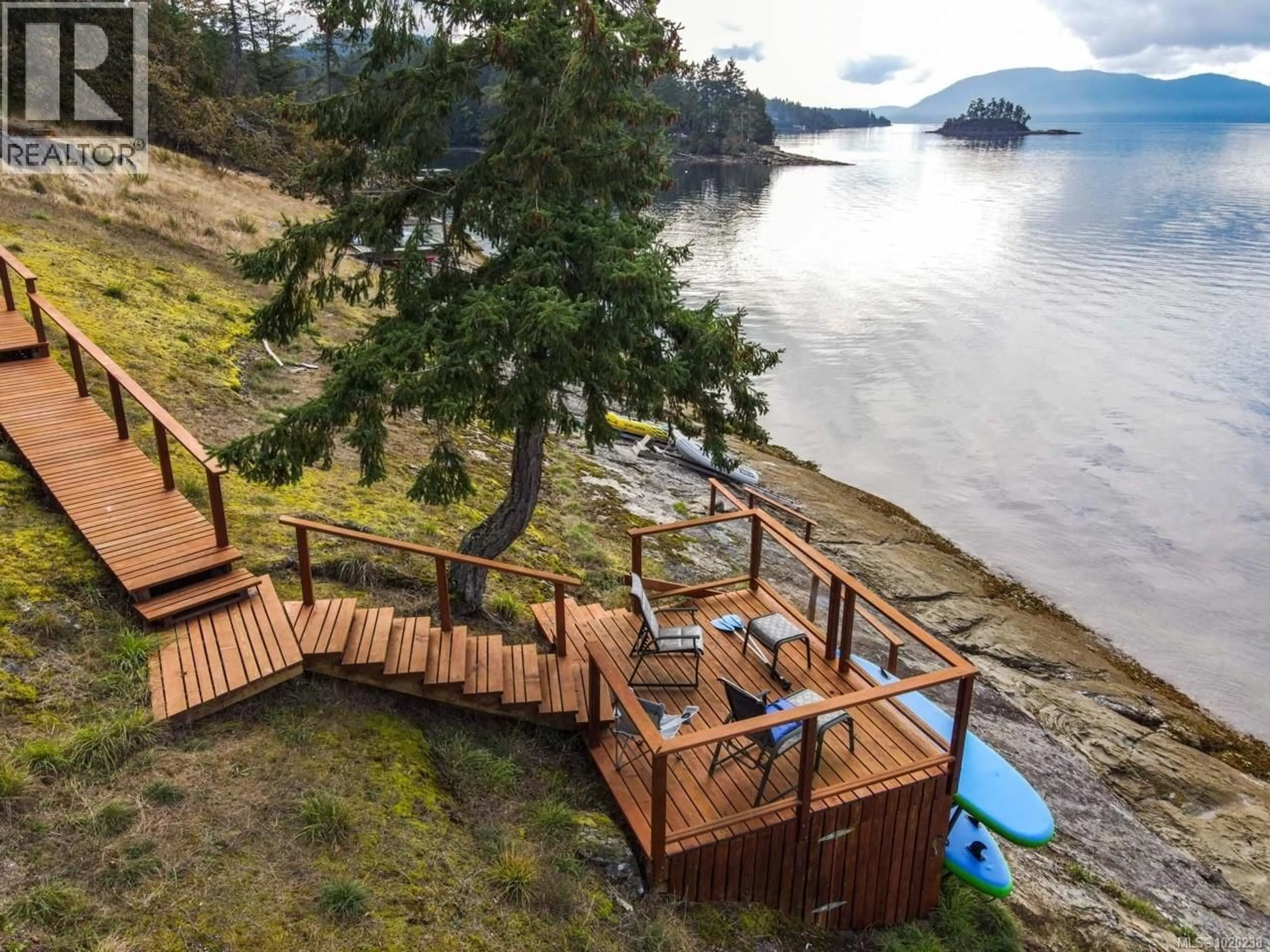 A pic from outside/outdoor area/front of a property/back of a property/a pic from drone, water/lake/river/ocean view for 214 DOGWOOD LANE, Salt Spring British Columbia V8K1A4