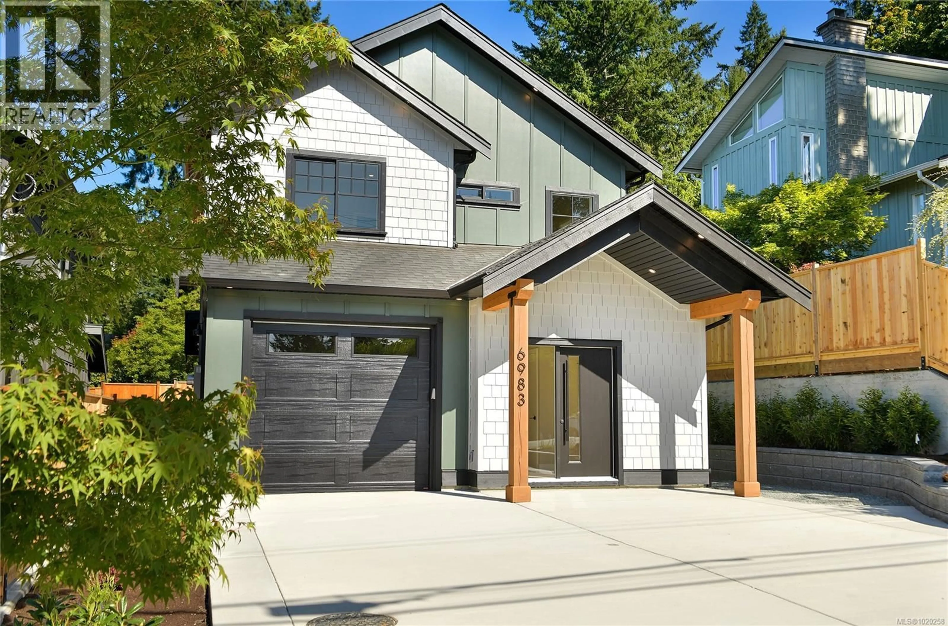 Home with vinyl exterior material, street for 6983 HAGAN ROAD, Central Saanich British Columbia V8M1B3