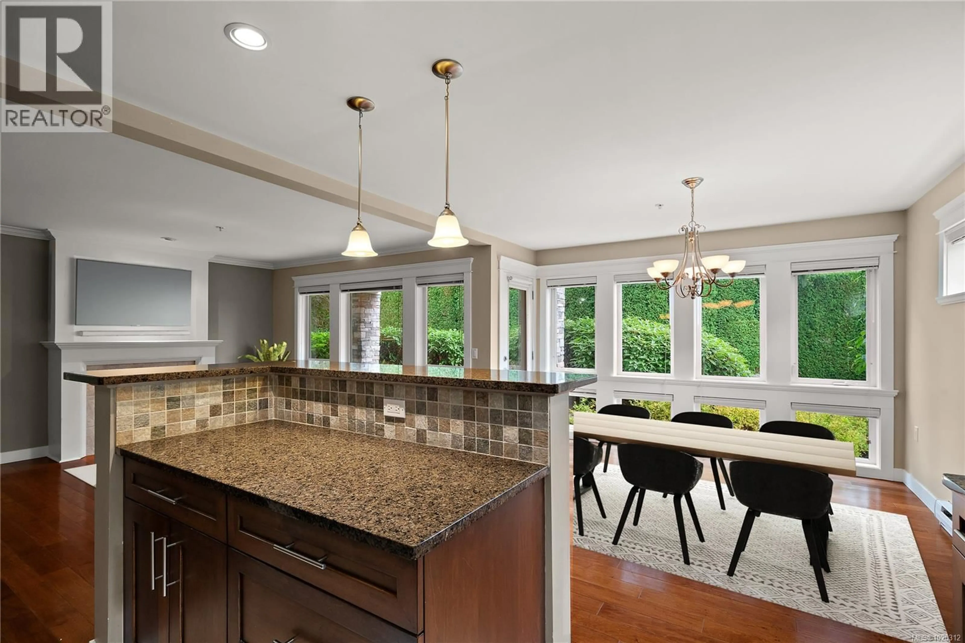 Open concept kitchen, ceramic/tile floor for 106 - 535 HEATHERDALE LANE, Saanich British Columbia V8Z0A4