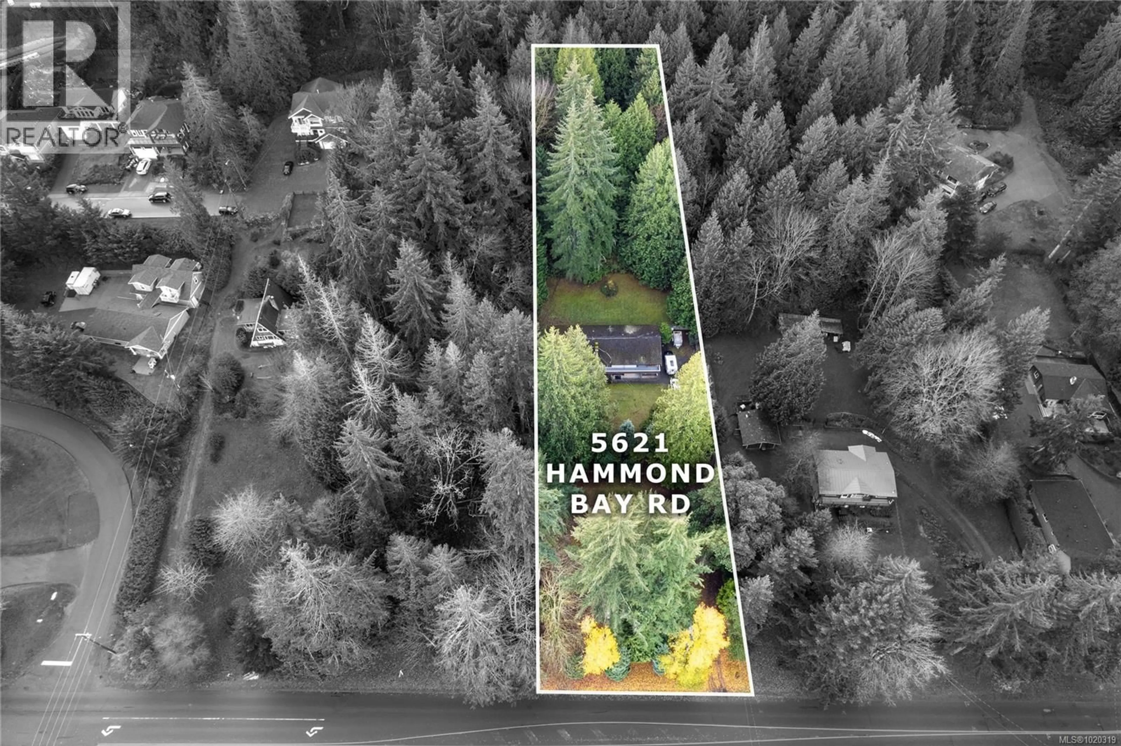 A pic from outside/outdoor area/front of a property/back of a property/a pic from drone, street for 5621 HAMMOND BAY ROAD, Nanaimo British Columbia V9T5N2