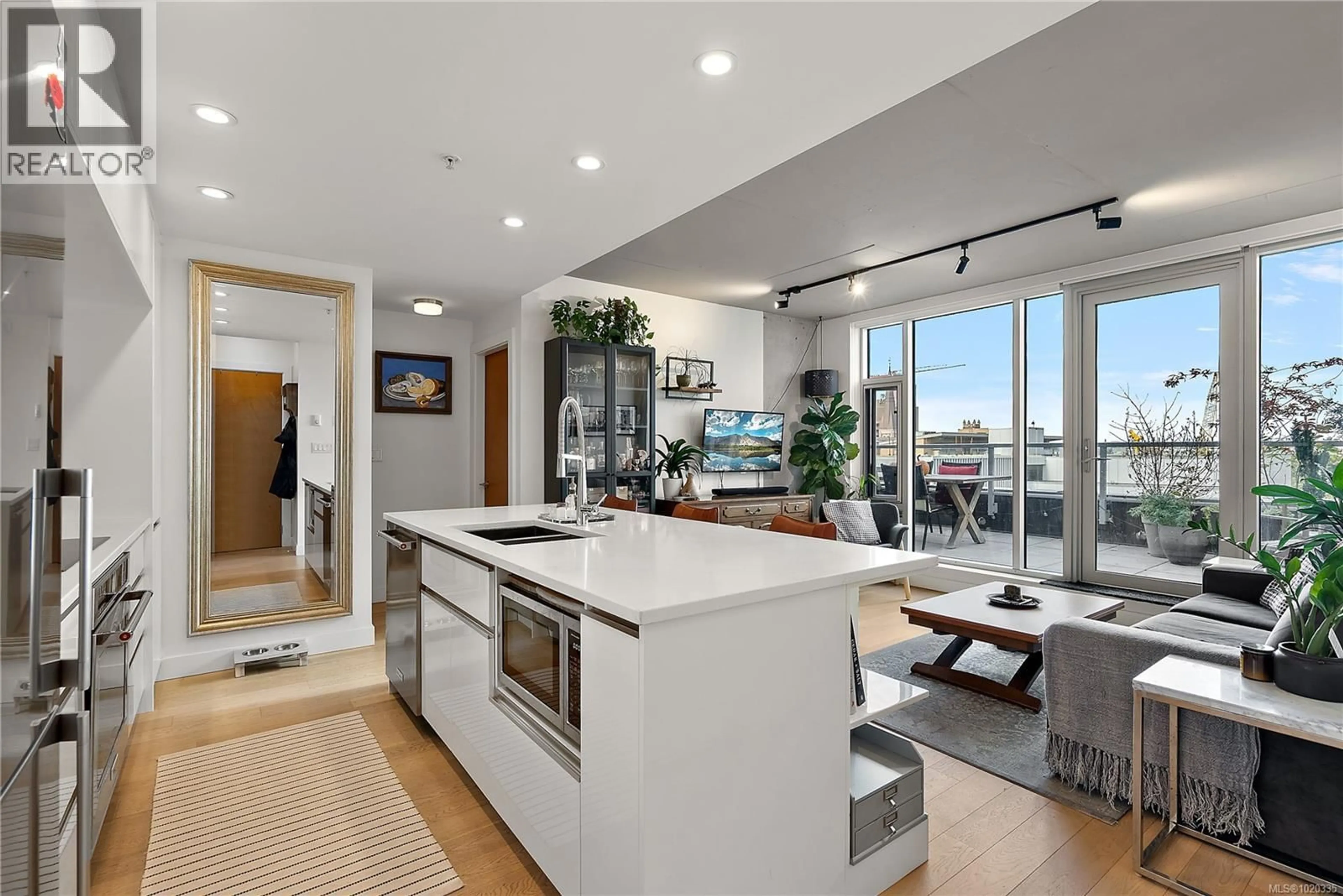 Open concept kitchen, ceramic/tile floor for 604 - 989 JOHNSON STREET, Victoria British Columbia V8V0E3