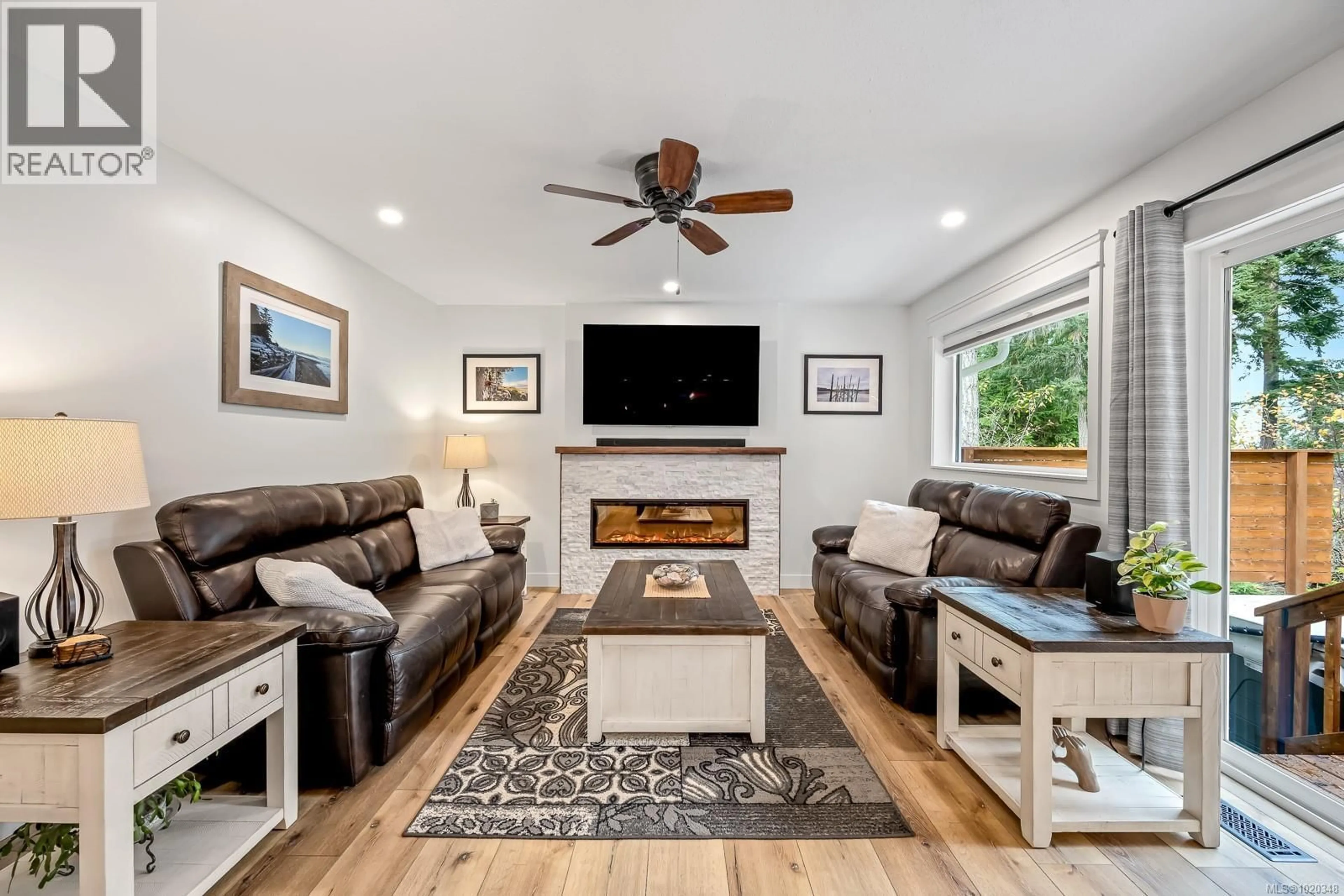 Living room with furniture, unknown for 6508 MYSTERY BEACH ROAD, Fanny Bay British Columbia V0R1W0