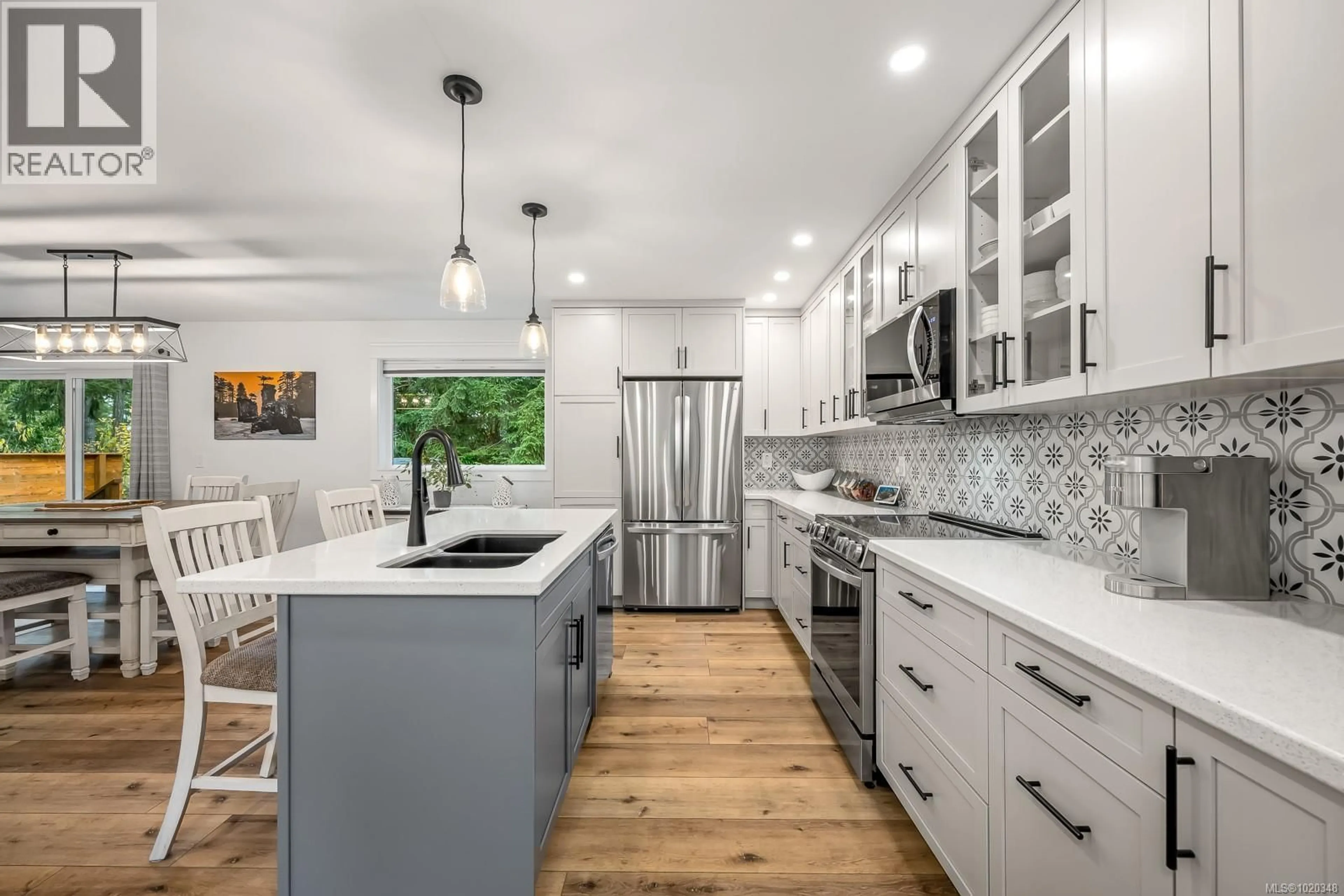 Open concept kitchen, ceramic/tile floor for 6508 MYSTERY BEACH ROAD, Fanny Bay British Columbia V0R1W0