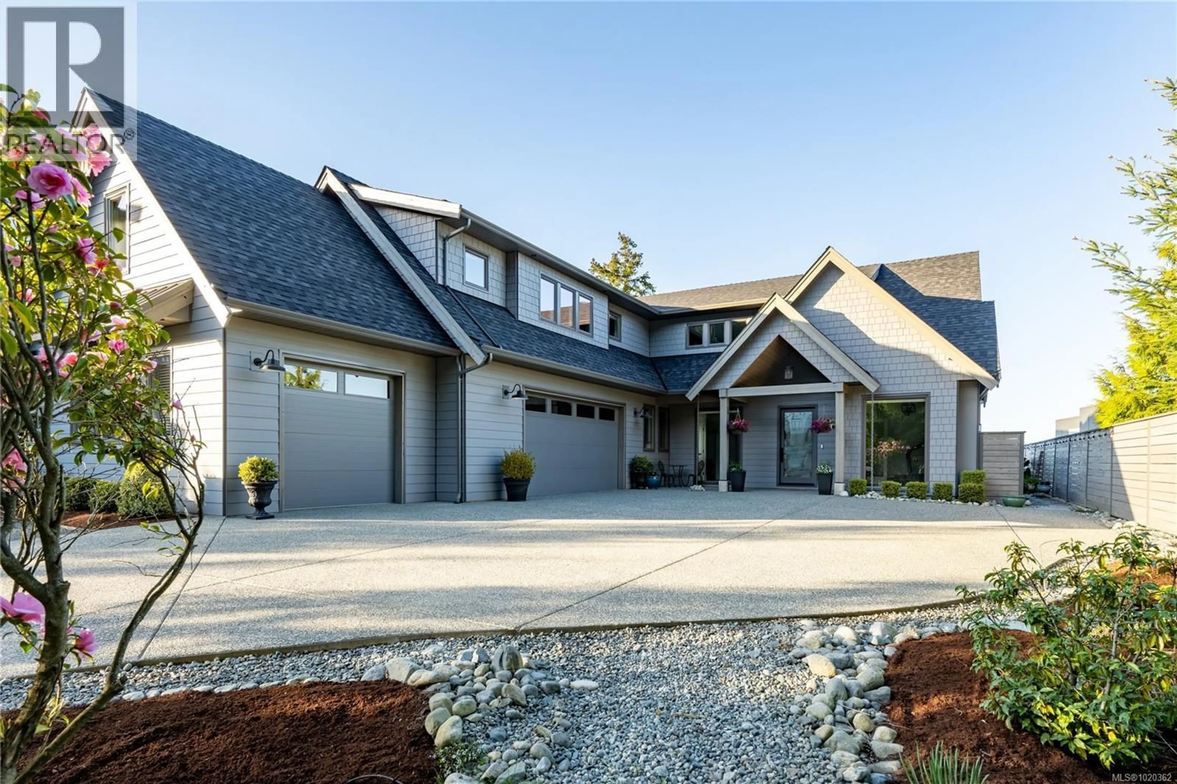 Home with brick exterior material, street for 7490 COPLEY RIDGE DRIVE, Lantzville British Columbia V0R2H0