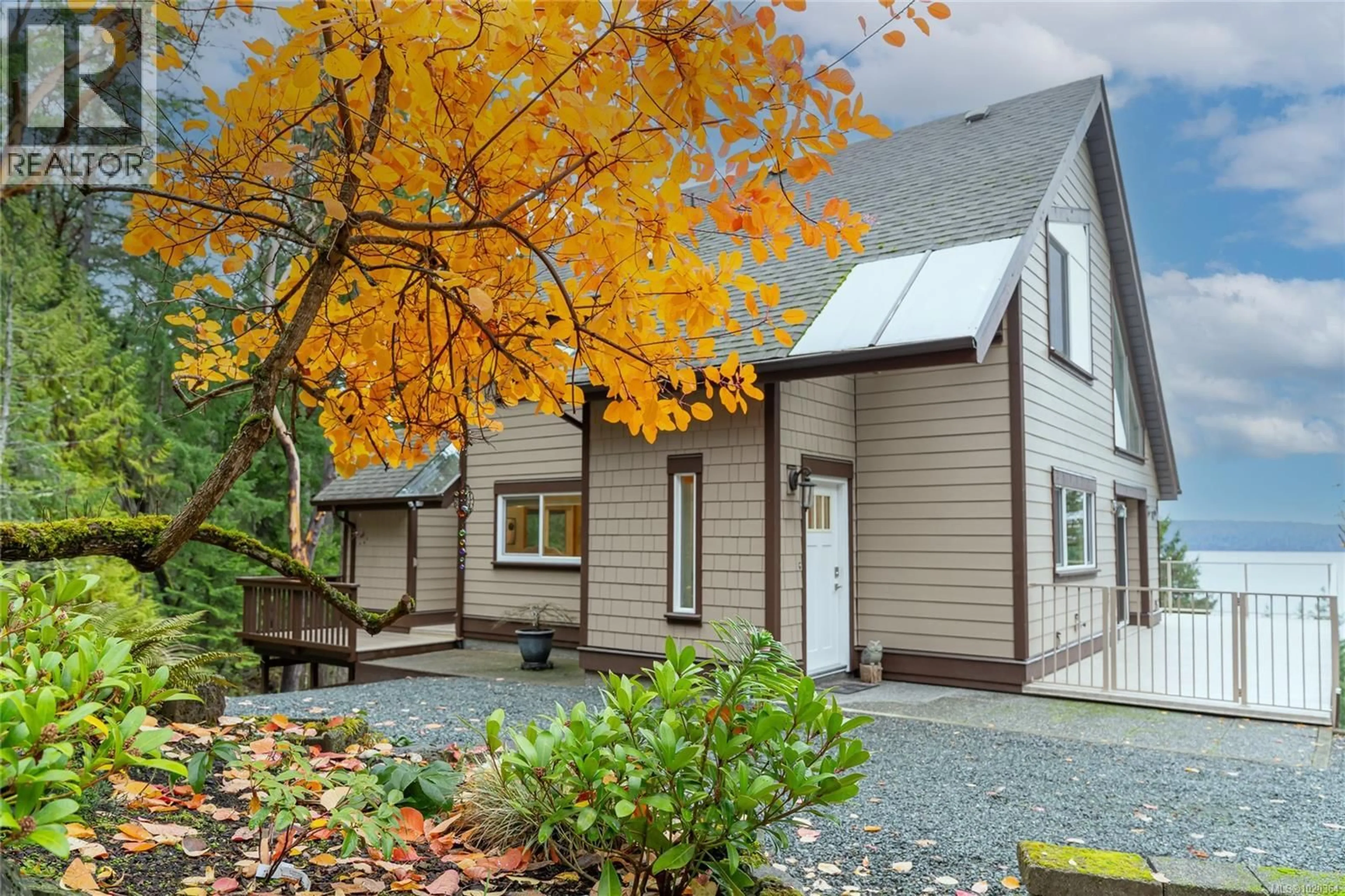 Home with vinyl exterior material, street for 148 PILKEY POINT ROAD, Thetis Island British Columbia V0R2Y0