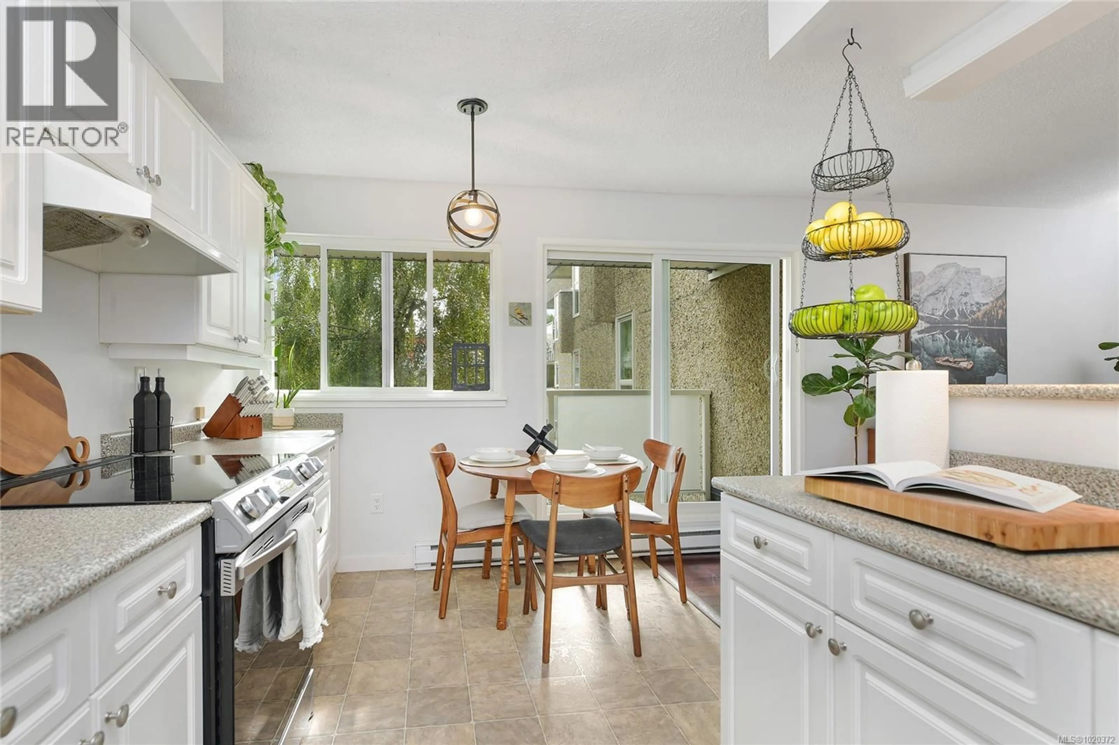 Open concept kitchen, ceramic/tile floor for 301 - 1366 HILLSIDE AVENUE, Victoria British Columbia V8T2B5