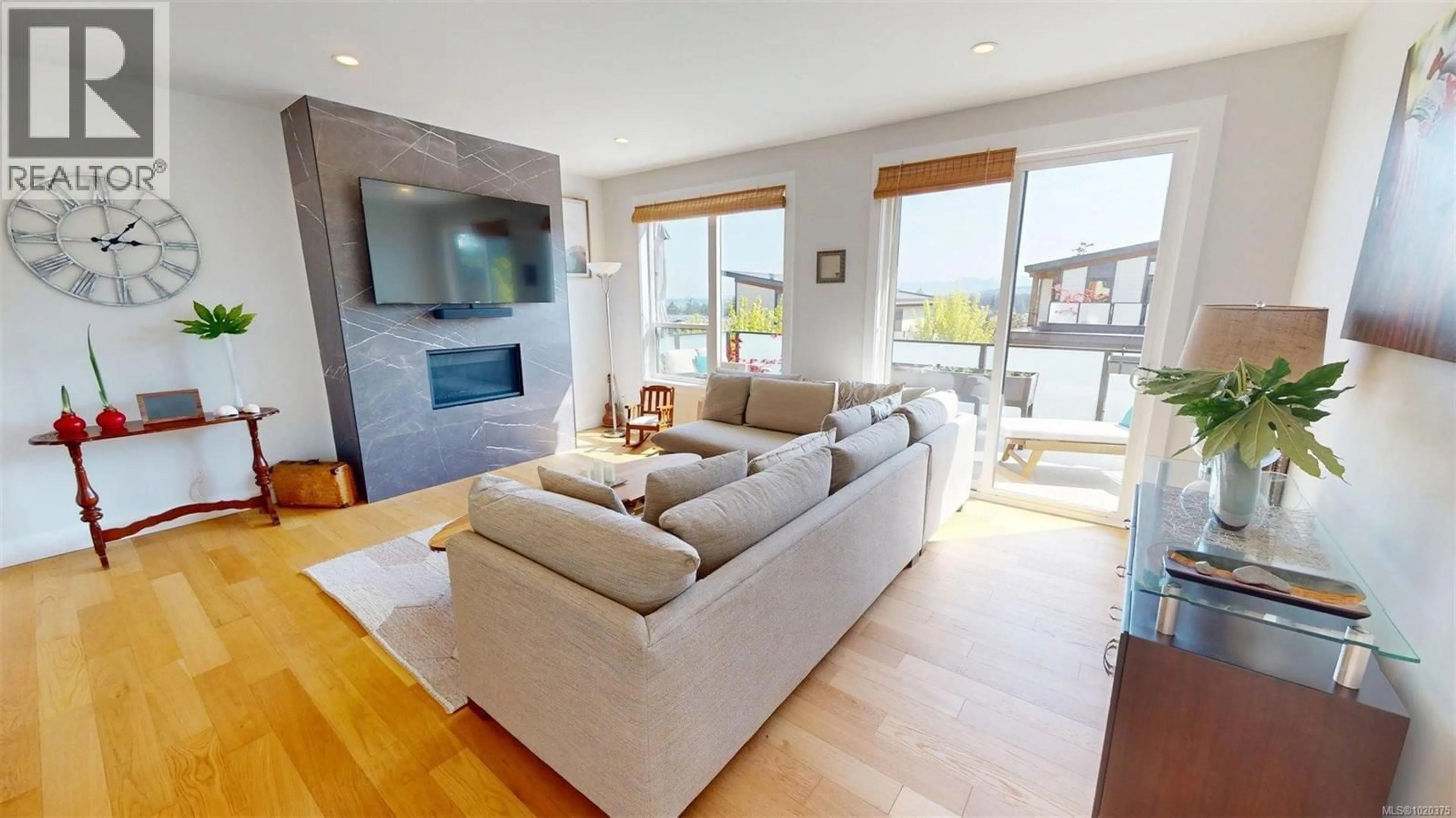Living room with furniture, wood/laminate floor for 103 - 1217 MANZANITA PLACE, Nanaimo British Columbia V9T0L7