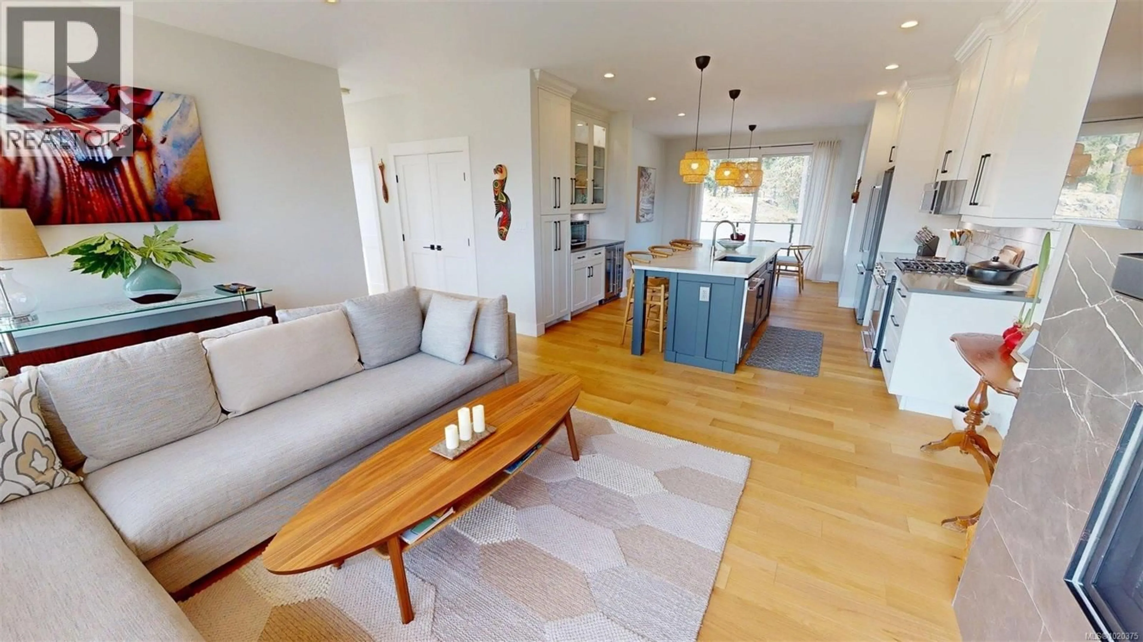 Living room with furniture, wood/laminate floor for 103 - 1217 MANZANITA PLACE, Nanaimo British Columbia V9T0L7