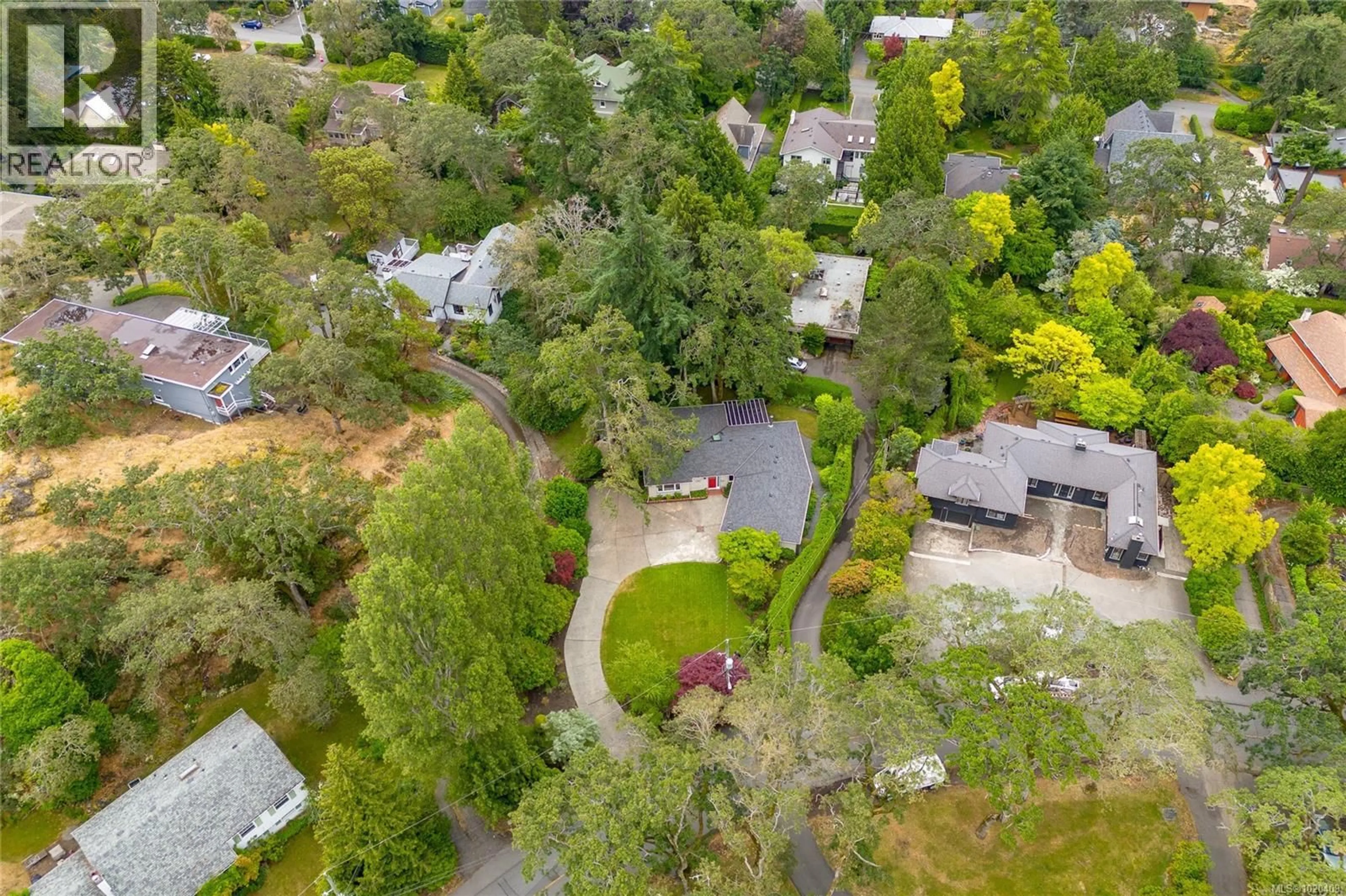 A pic from outside/outdoor area/front of a property/back of a property/a pic from drone, street for 1941 MAYFAIR DRIVE, Saanich British Columbia V8P1R1