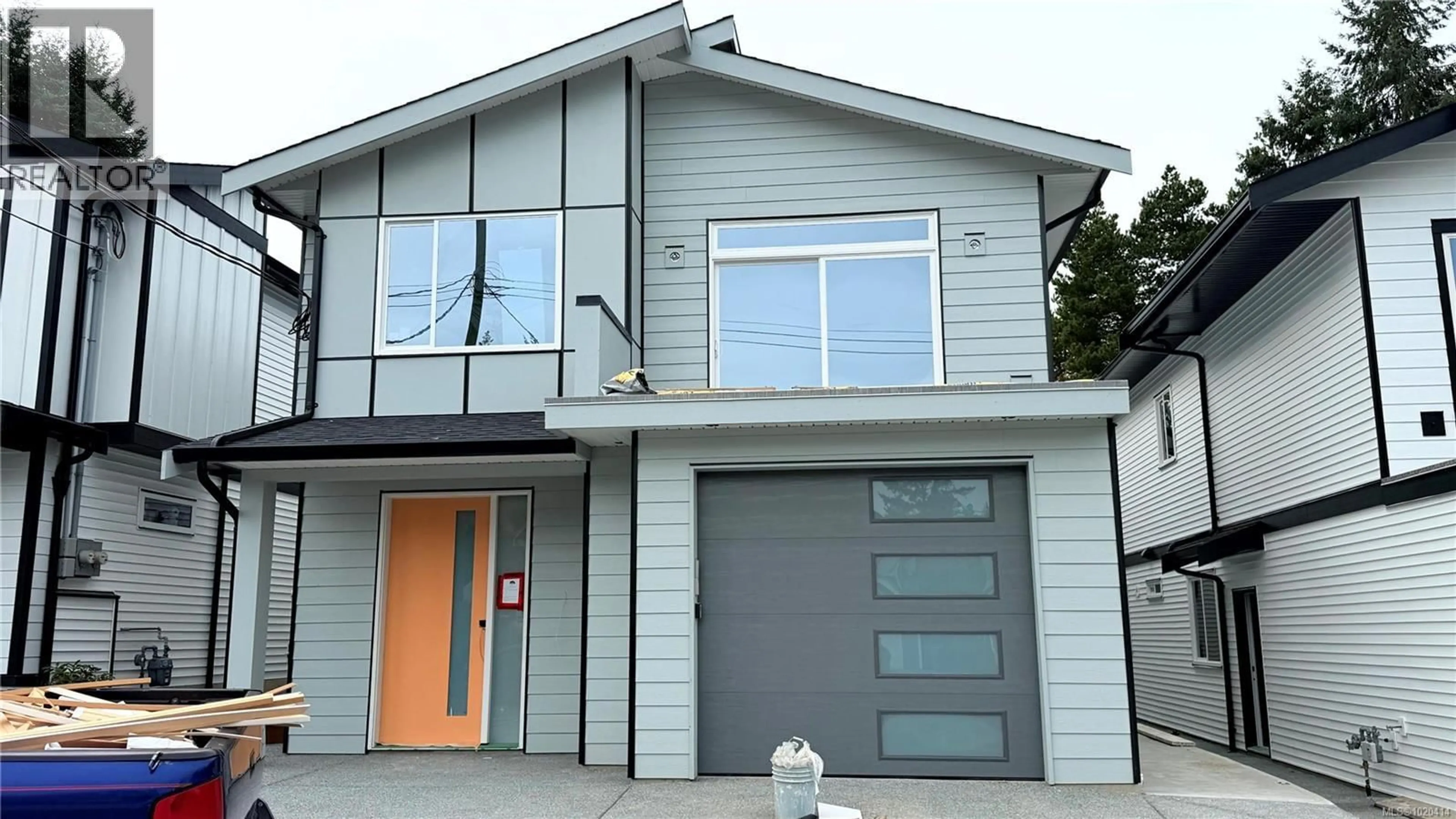 Home with vinyl exterior material, street for 2391 BARCLAY ROAD, Nanaimo British Columbia V9T3J8