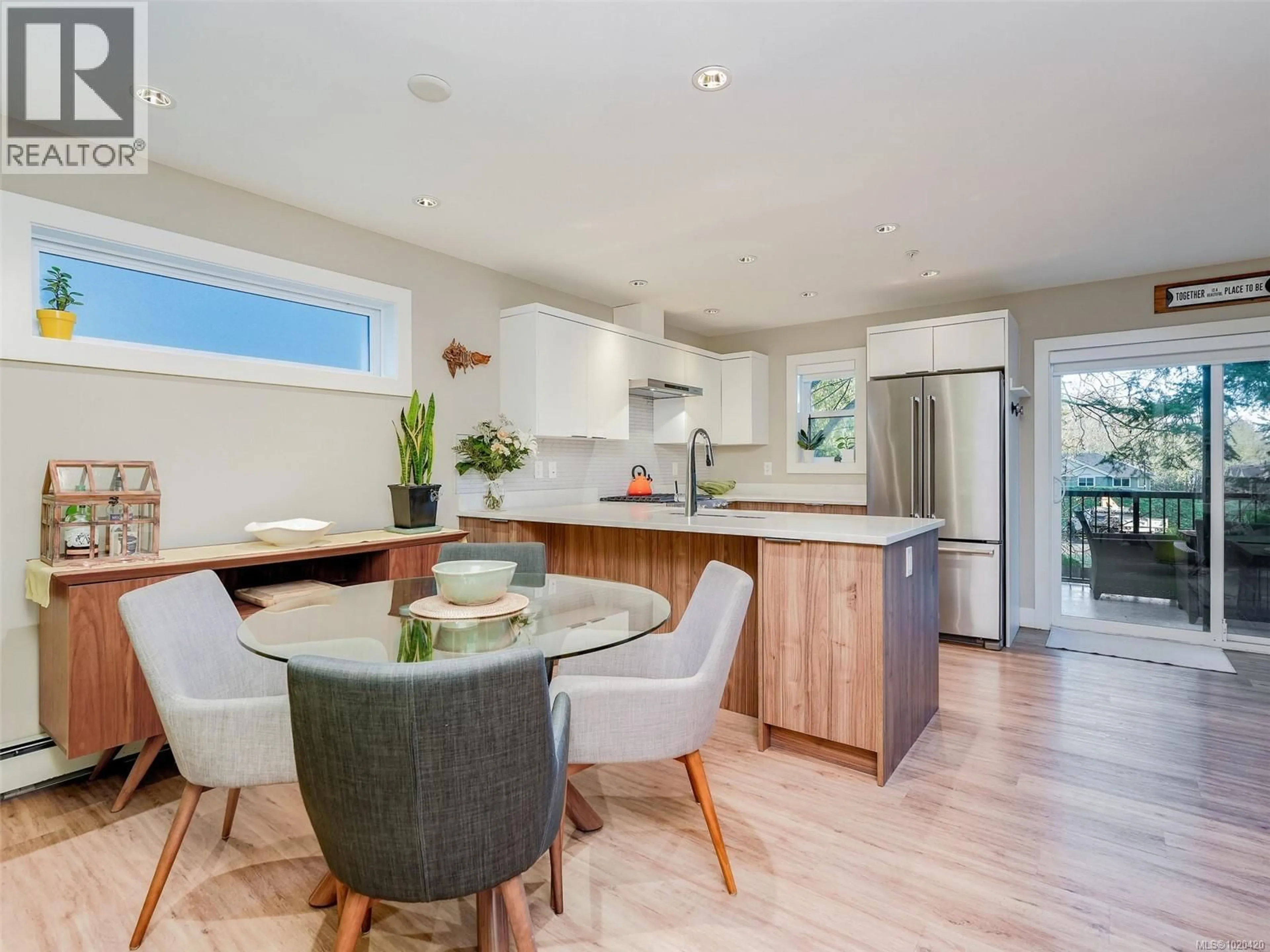 Open concept kitchen, wood/laminate floor for 106 - 2096 KENNEDY STREET, Sooke British Columbia V9Z0Z1