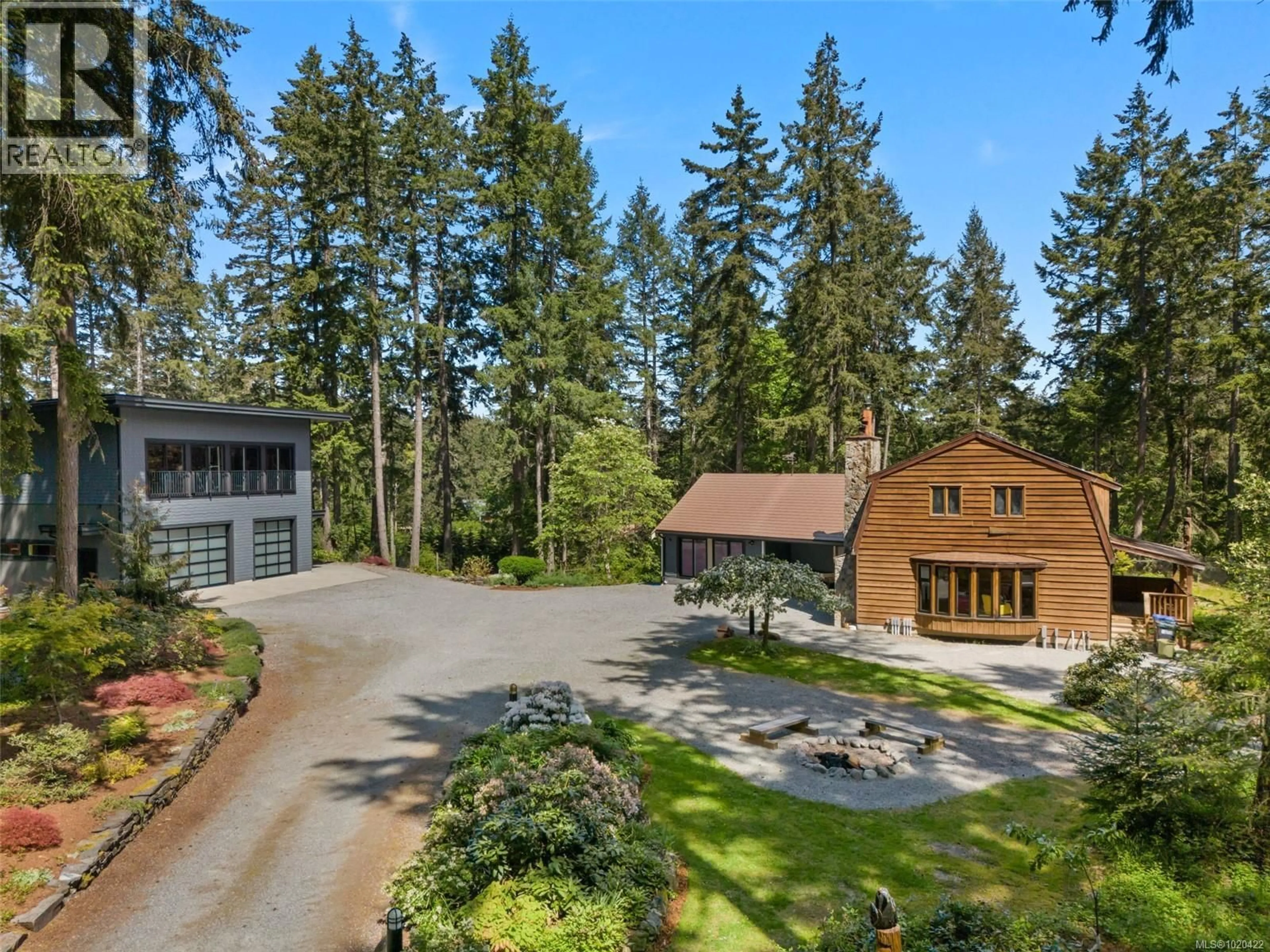 A pic from outside/outdoor area/front of a property/back of a property/a pic from drone, forest/trees view for 3281 MCGUIRE WAY, Nanaimo British Columbia V9G1C4