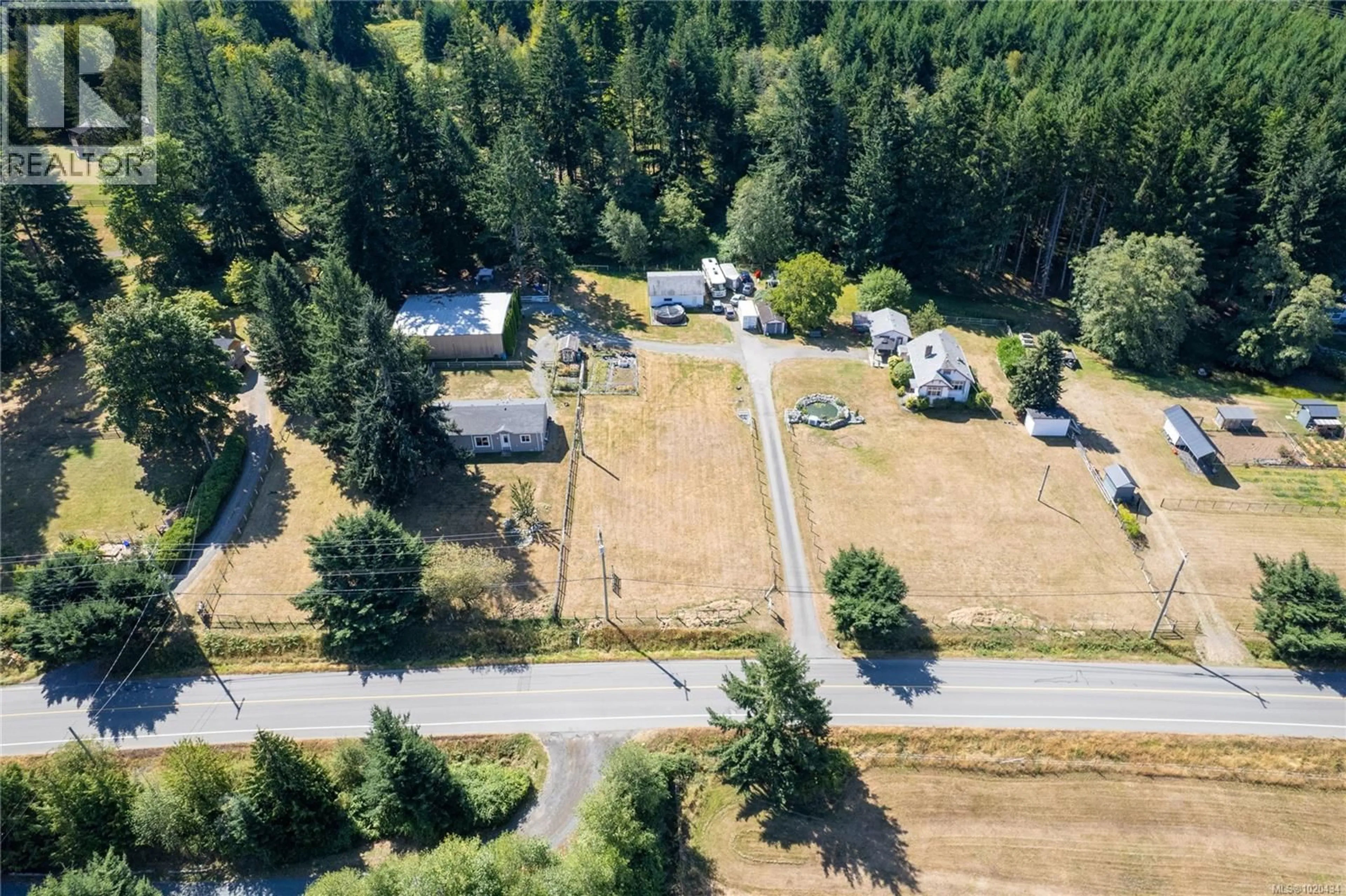 A pic from outside/outdoor area/front of a property/back of a property/a pic from drone, unknown for 2687 JINGLE POT ROAD, Nanaimo British Columbia V9R6W5