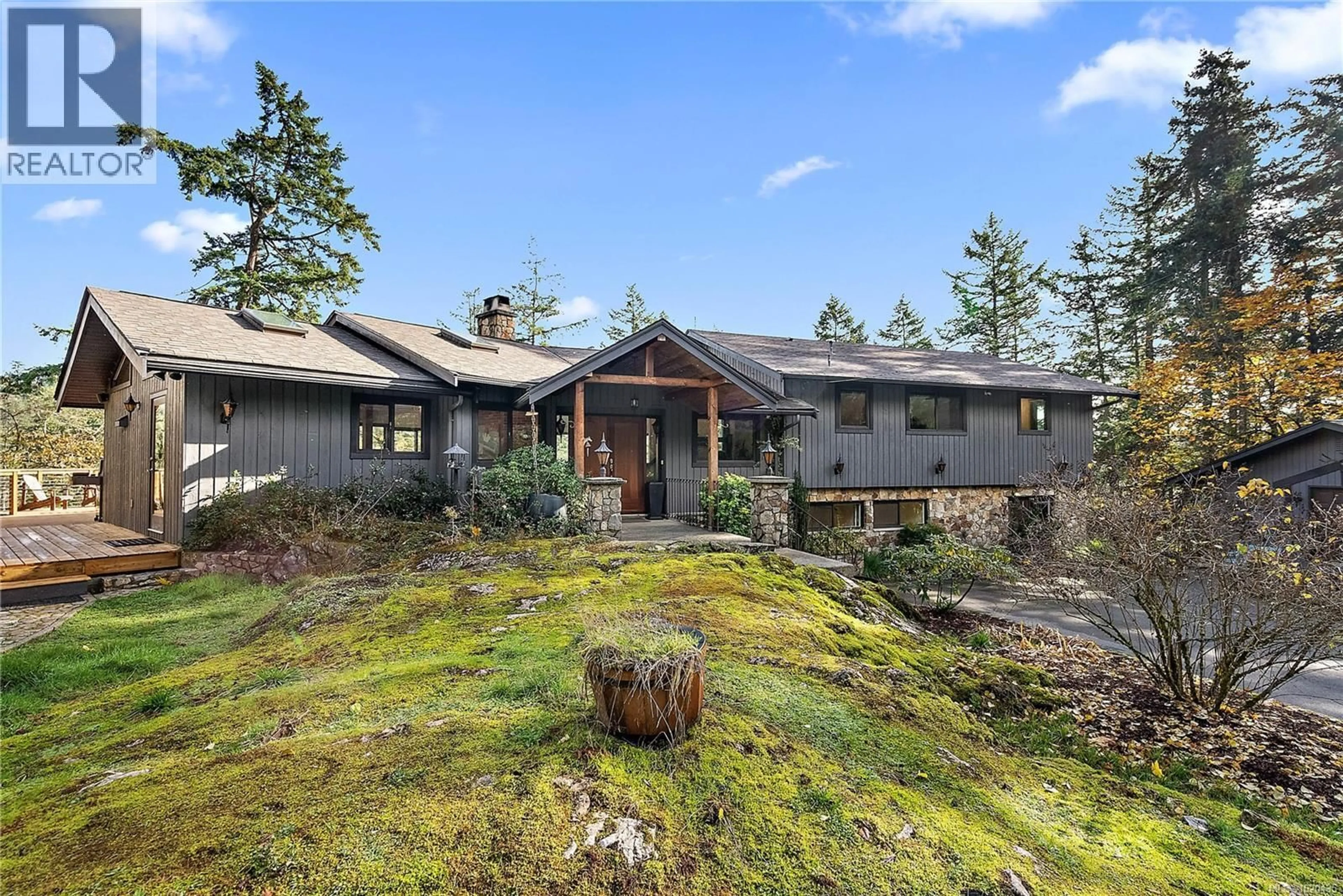 A pic from outside/outdoor area/front of a property/back of a property/a pic from drone, forest/trees view for 235 HARTLAND AVENUE, Saanich British Columbia V9E1L7