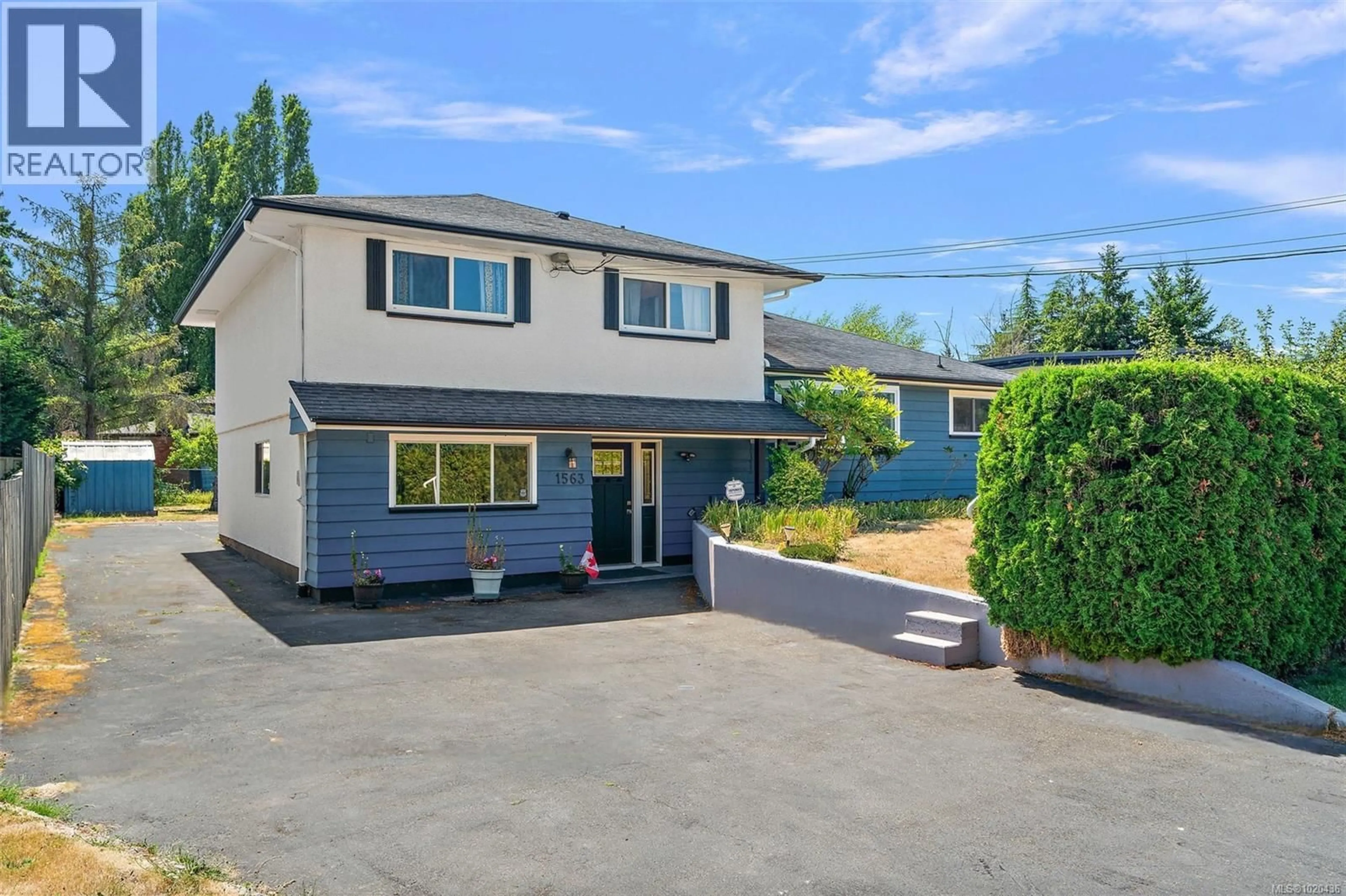 A pic from outside/outdoor area/front of a property/back of a property/a pic from drone, street for 1563 KENMORE ROAD, Saanich British Columbia V8N2E2