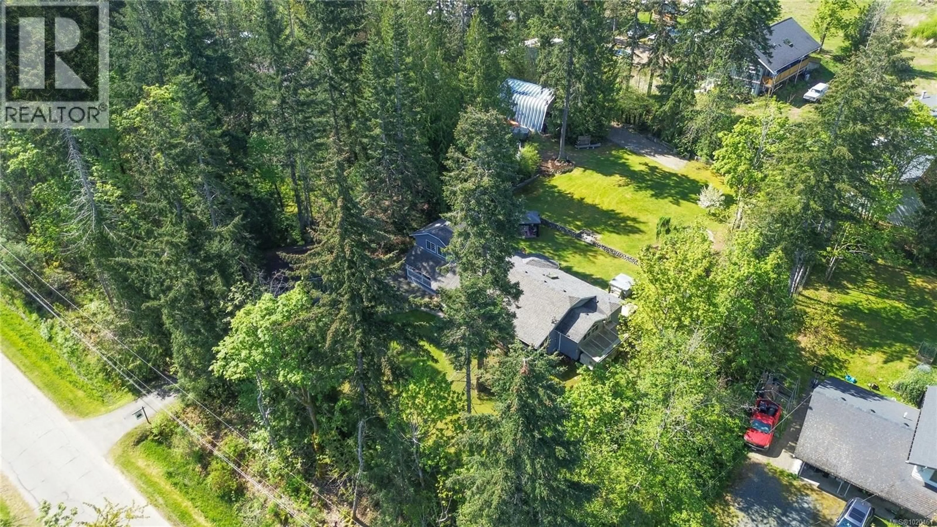 A pic from outside/outdoor area/front of a property/back of a property/a pic from drone, forest/trees view for 777 SALSBURY ROAD, Courtenay British Columbia V9N9M2