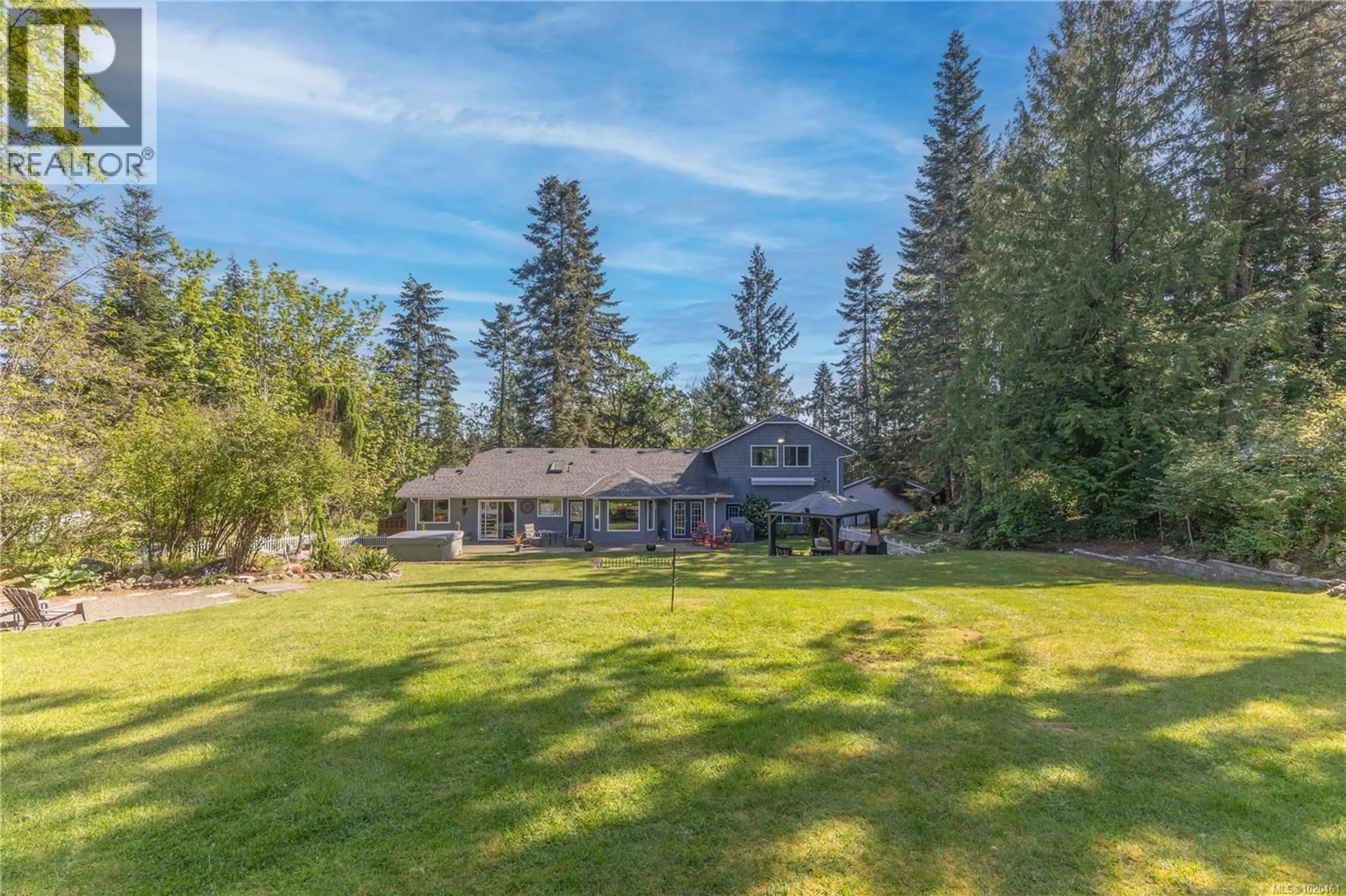 A pic from outside/outdoor area/front of a property/back of a property/a pic from drone, unknown for 777 SALSBURY ROAD, Courtenay British Columbia V9N9M2