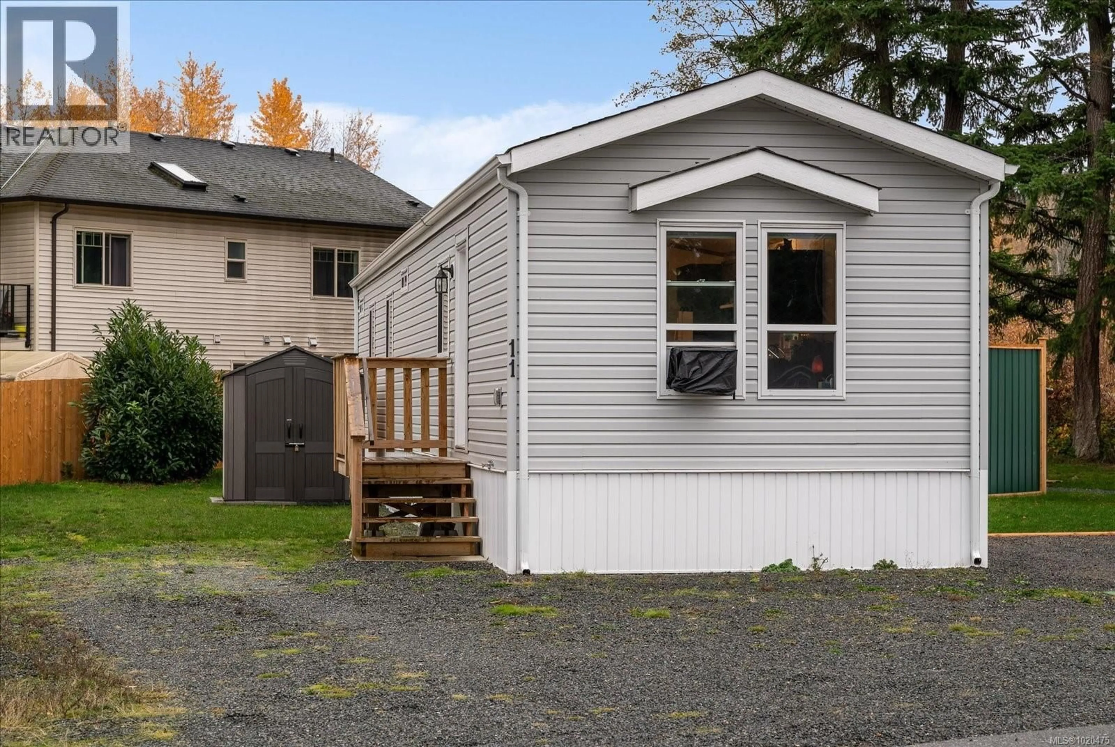 Home with vinyl exterior material, street for 11 - 6820 PARKLANDS PLACE, Lantzville British Columbia V0R2H0