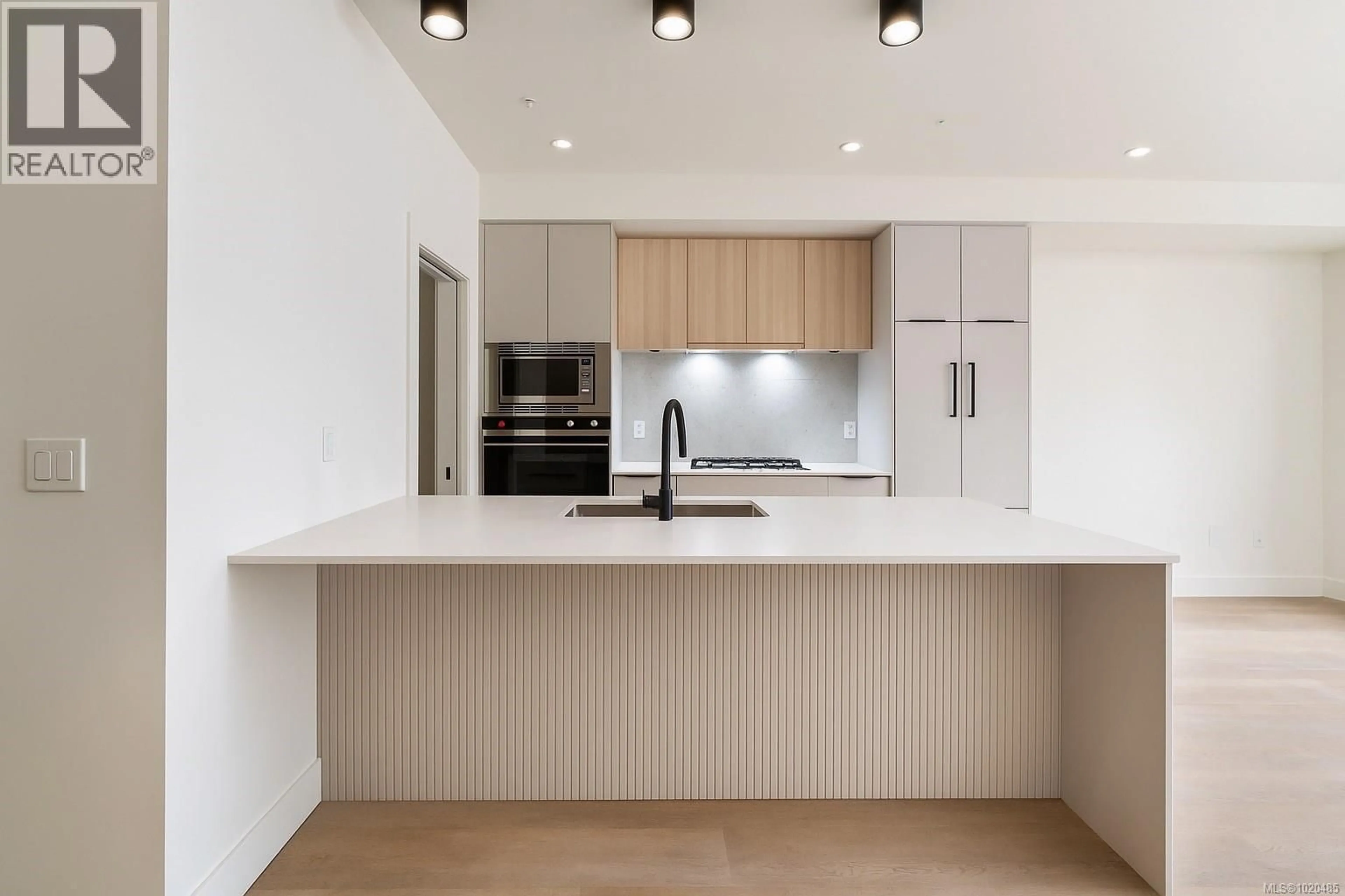 Open concept kitchen, unknown for 308 - 2341 BEAR MOUNTAIN PARKWAY, Langford British Columbia V9B6V1