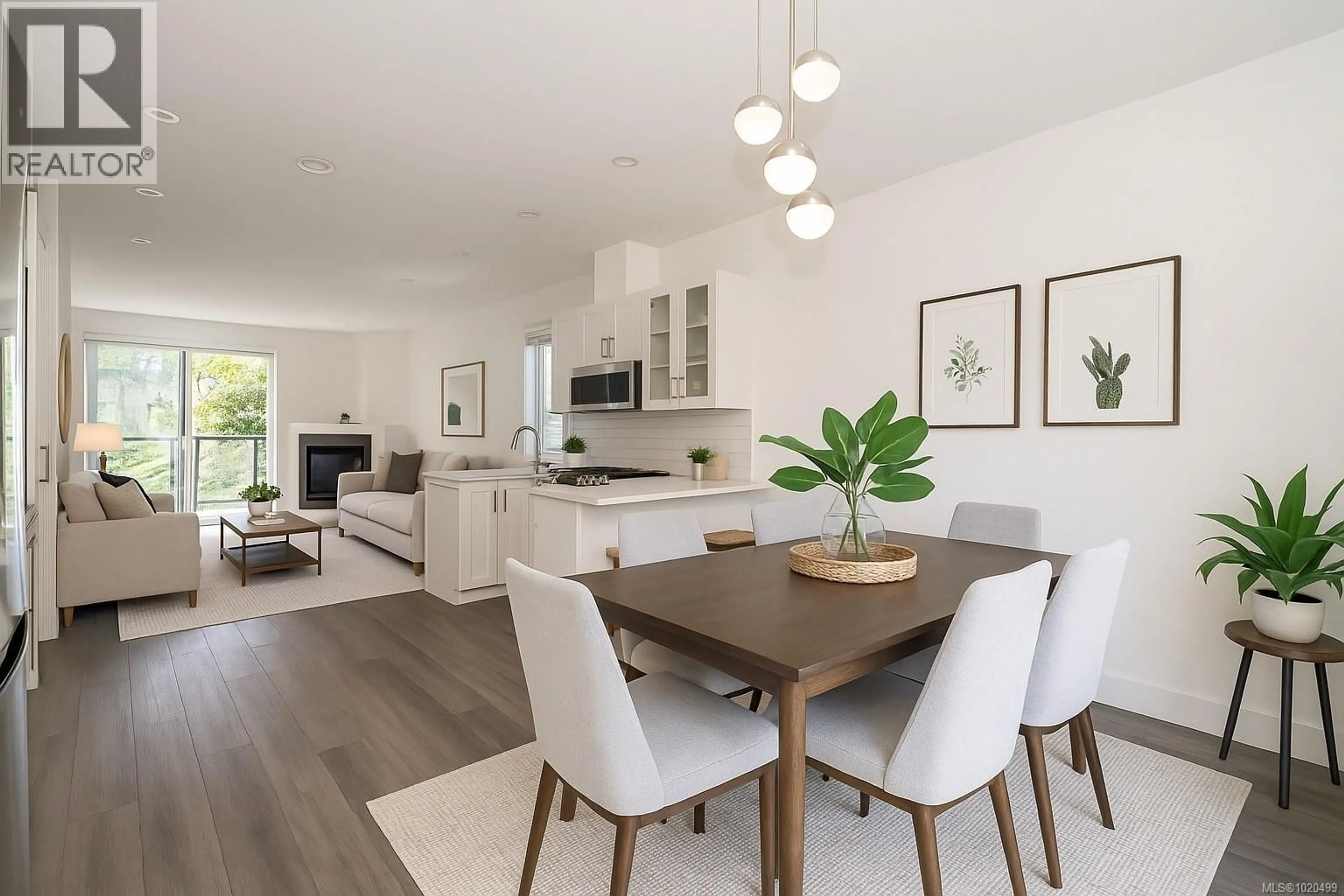 Open concept kitchen, wood/laminate floor for 900 TURNSTONE RIDGE, Langford British Columbia V9C2Y4