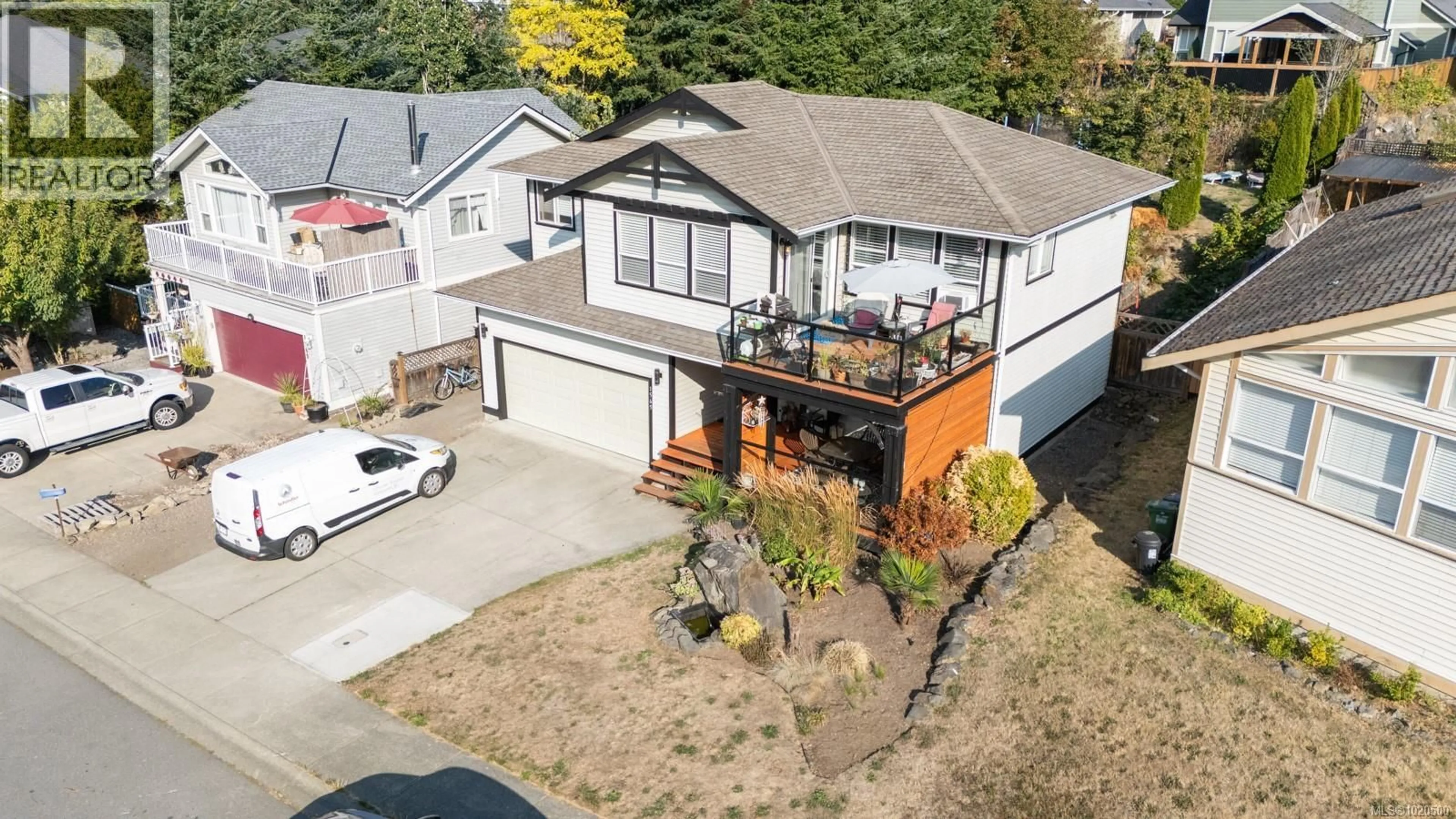 A pic from outside/outdoor area/front of a property/back of a property/a pic from drone, street for 1565 NIMPKISH PLACE, Duncan British Columbia V9L0A6