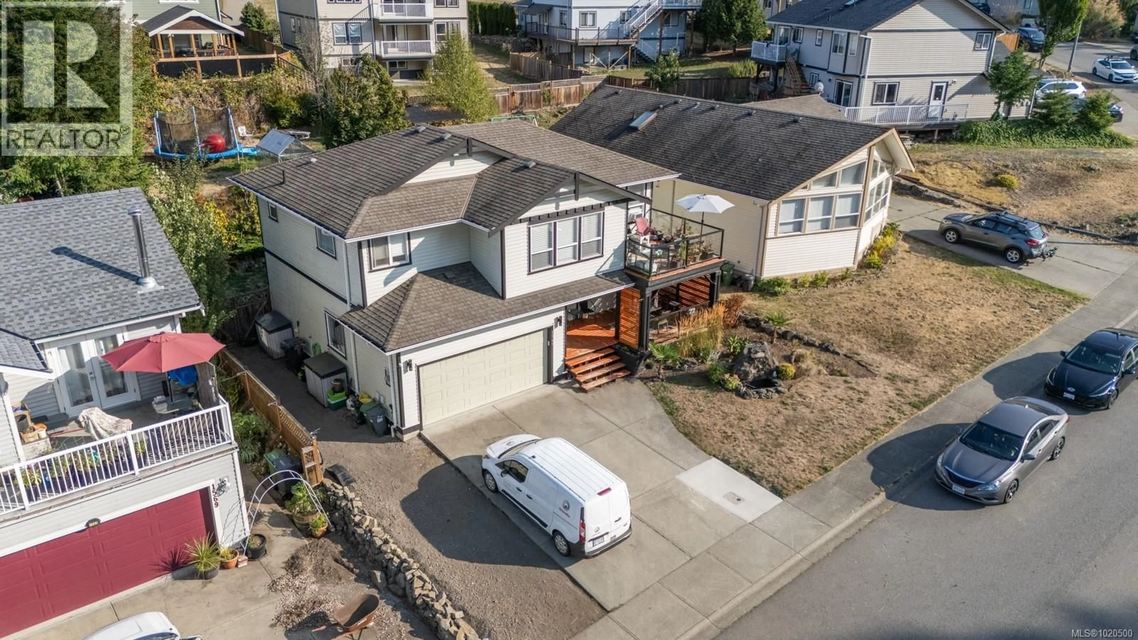 A pic from outside/outdoor area/front of a property/back of a property/a pic from drone, street for 1565 NIMPKISH PLACE, Duncan British Columbia V9L0A6