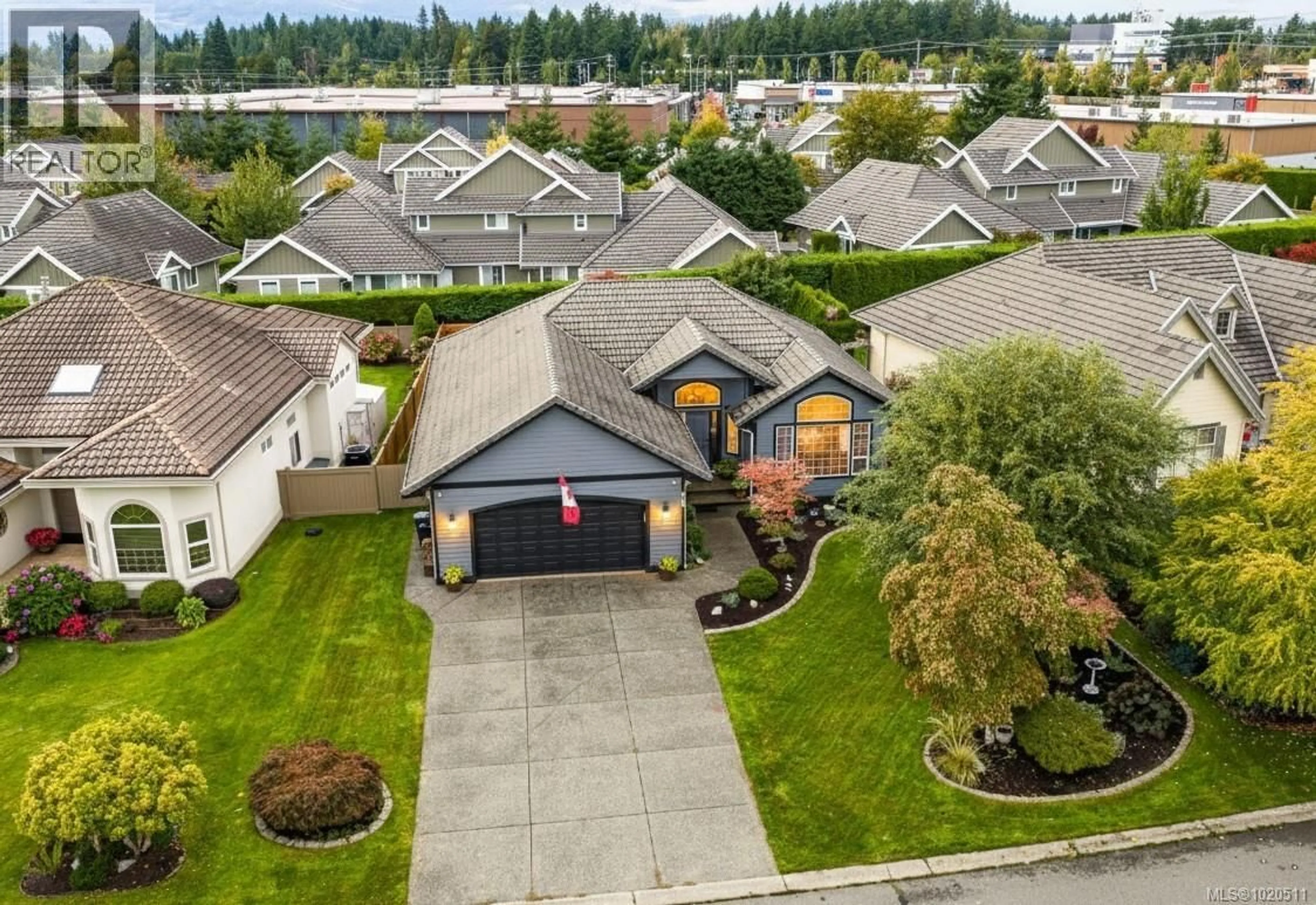 A pic from outside/outdoor area/front of a property/back of a property/a pic from drone, street for 589 MONARCH DRIVE, Courtenay British Columbia V9N8R7