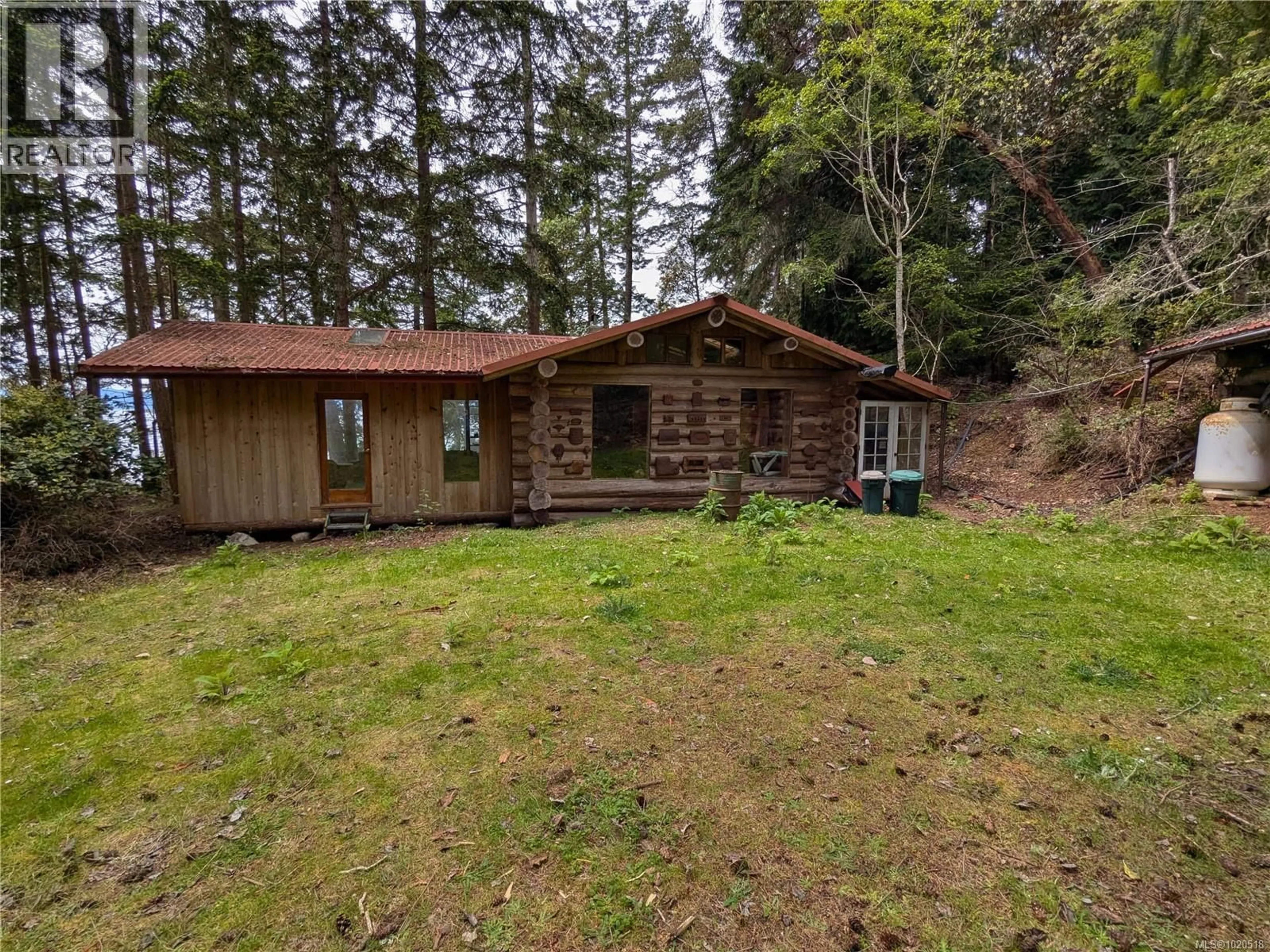A pic from outside/outdoor area/front of a property/back of a property/a pic from drone, forest/trees view for 3 GRANT ROAD, Lasqueti Island British Columbia V0R2J0