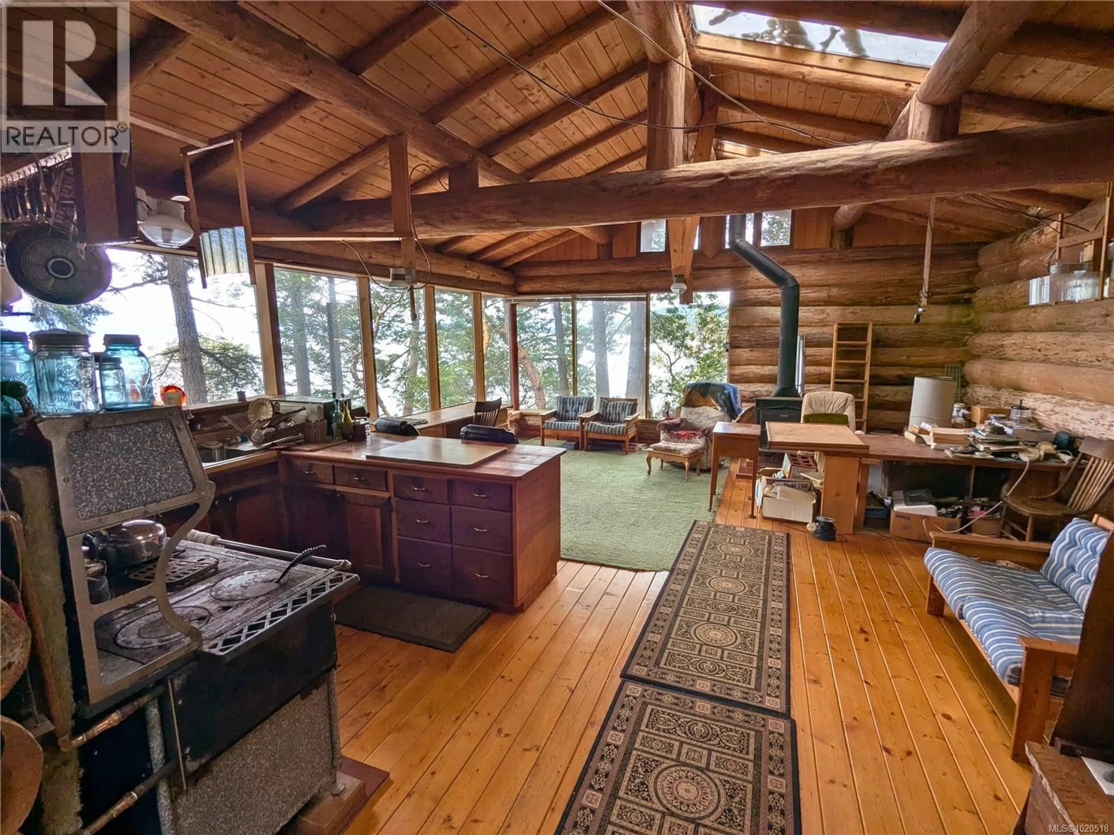 Open concept kitchen, wood/laminate floor for 3 GRANT ROAD, Lasqueti Island British Columbia V0R2J0