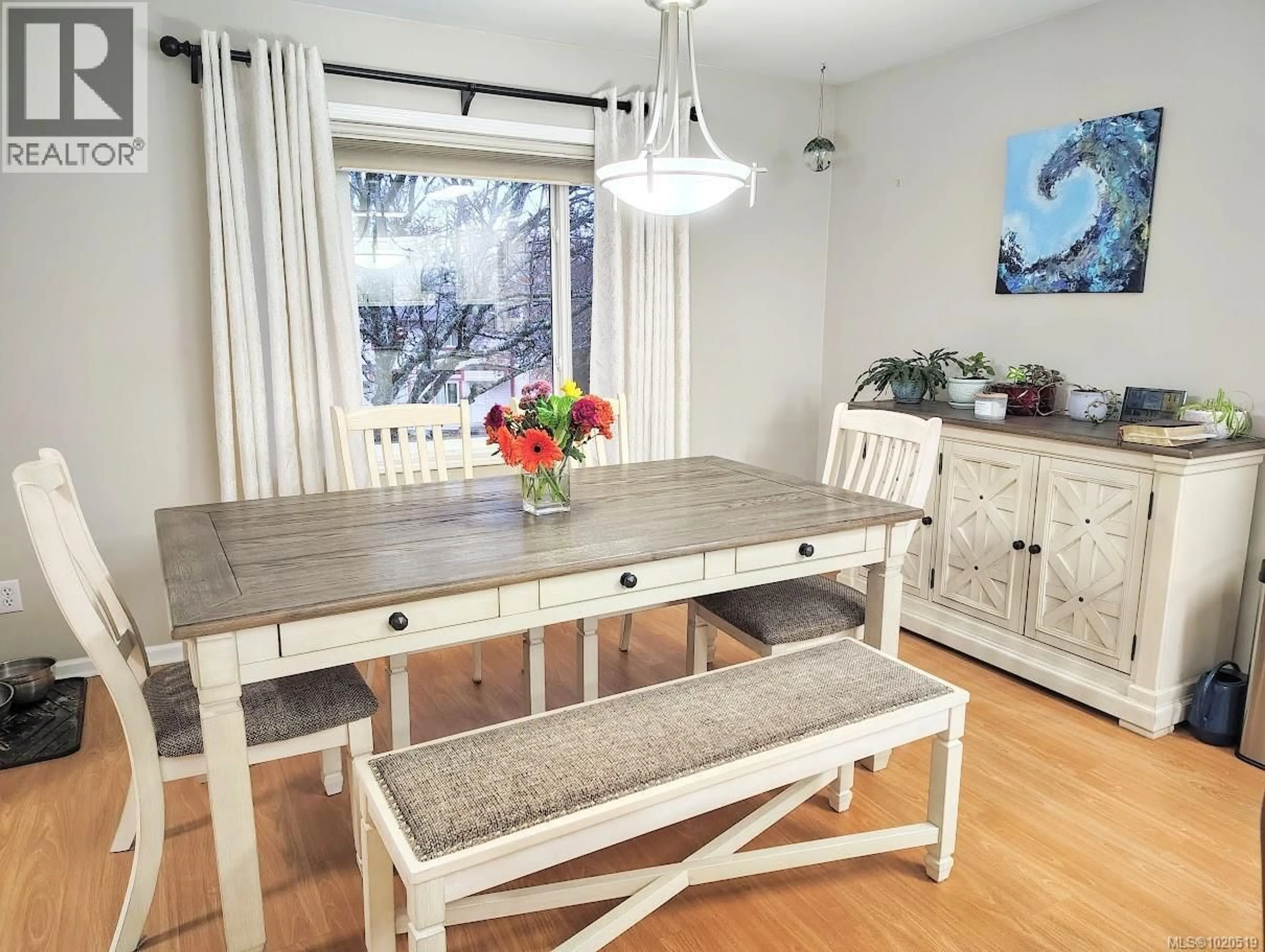 Dining room, wood/laminate floor for 2435 4TH AVENUE, Port Alberni British Columbia V9Y2E2