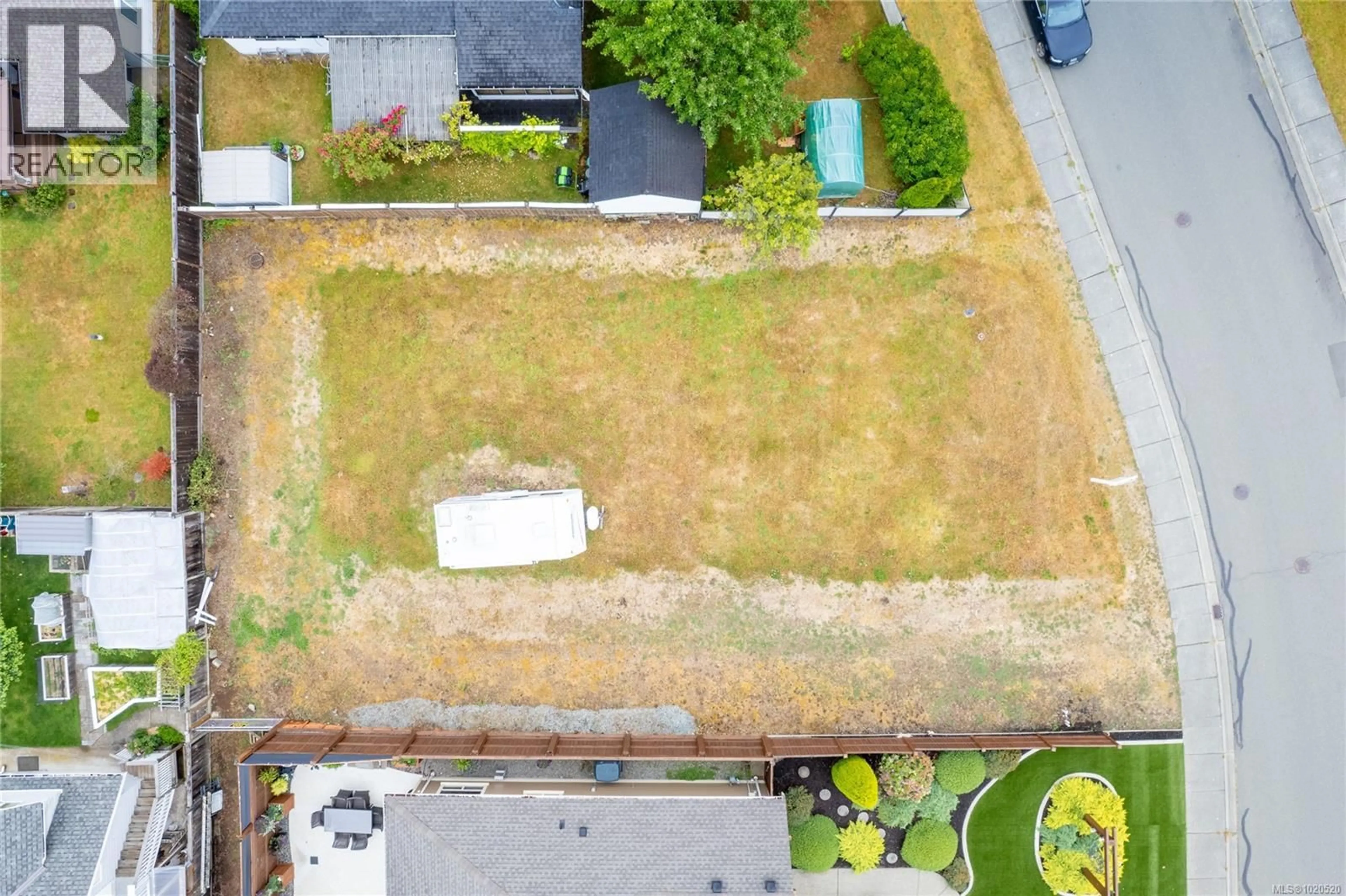 A pic from outside/outdoor area/front of a property/back of a property/a pic from drone, street for 715 DOEHLE AVENUE, Parksville British Columbia V9P2V1