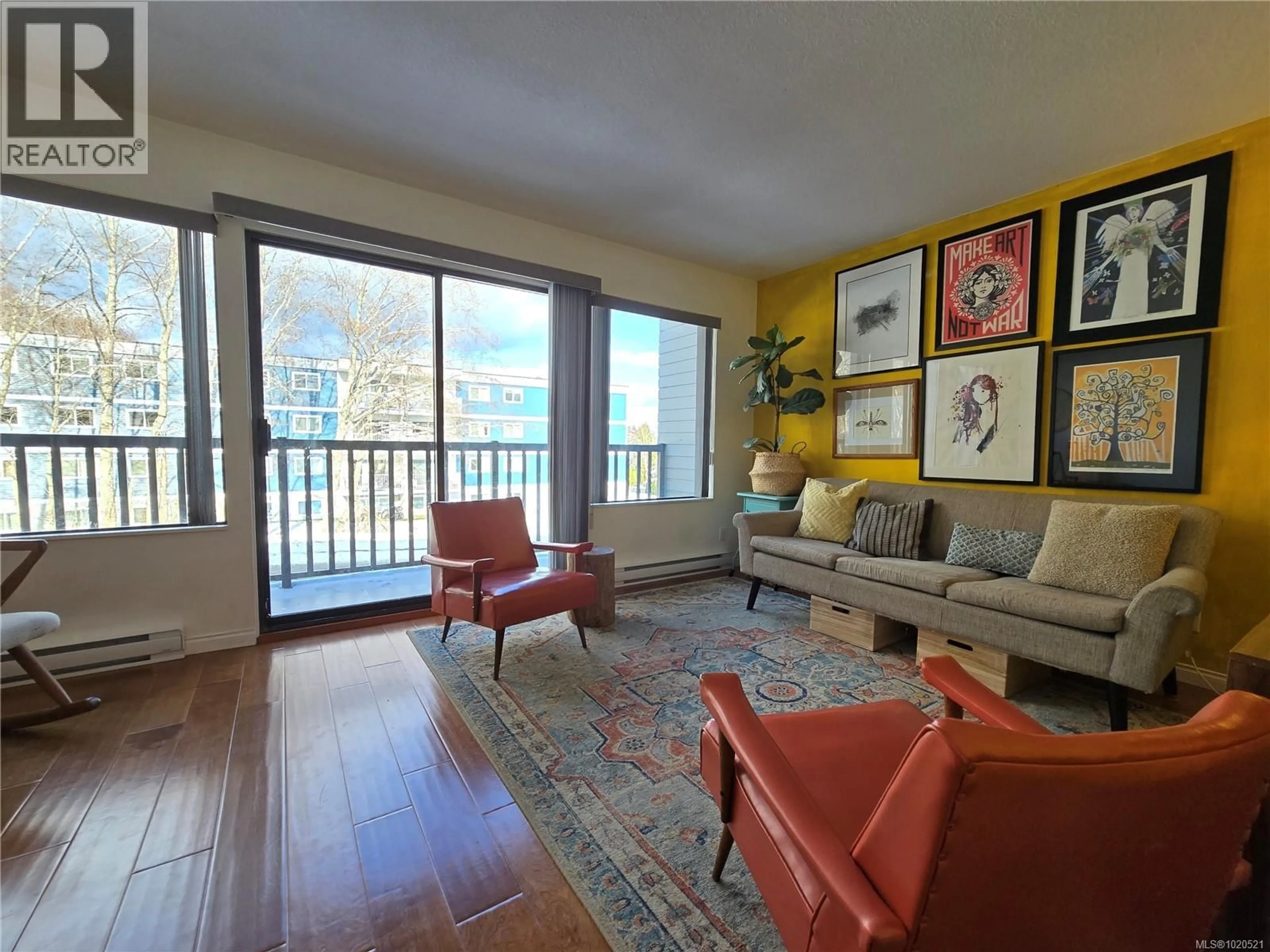 Living room with furniture, wood/laminate floor for 11 - 8805 CENTRAL STREET, Port Hardy British Columbia V0N2P0