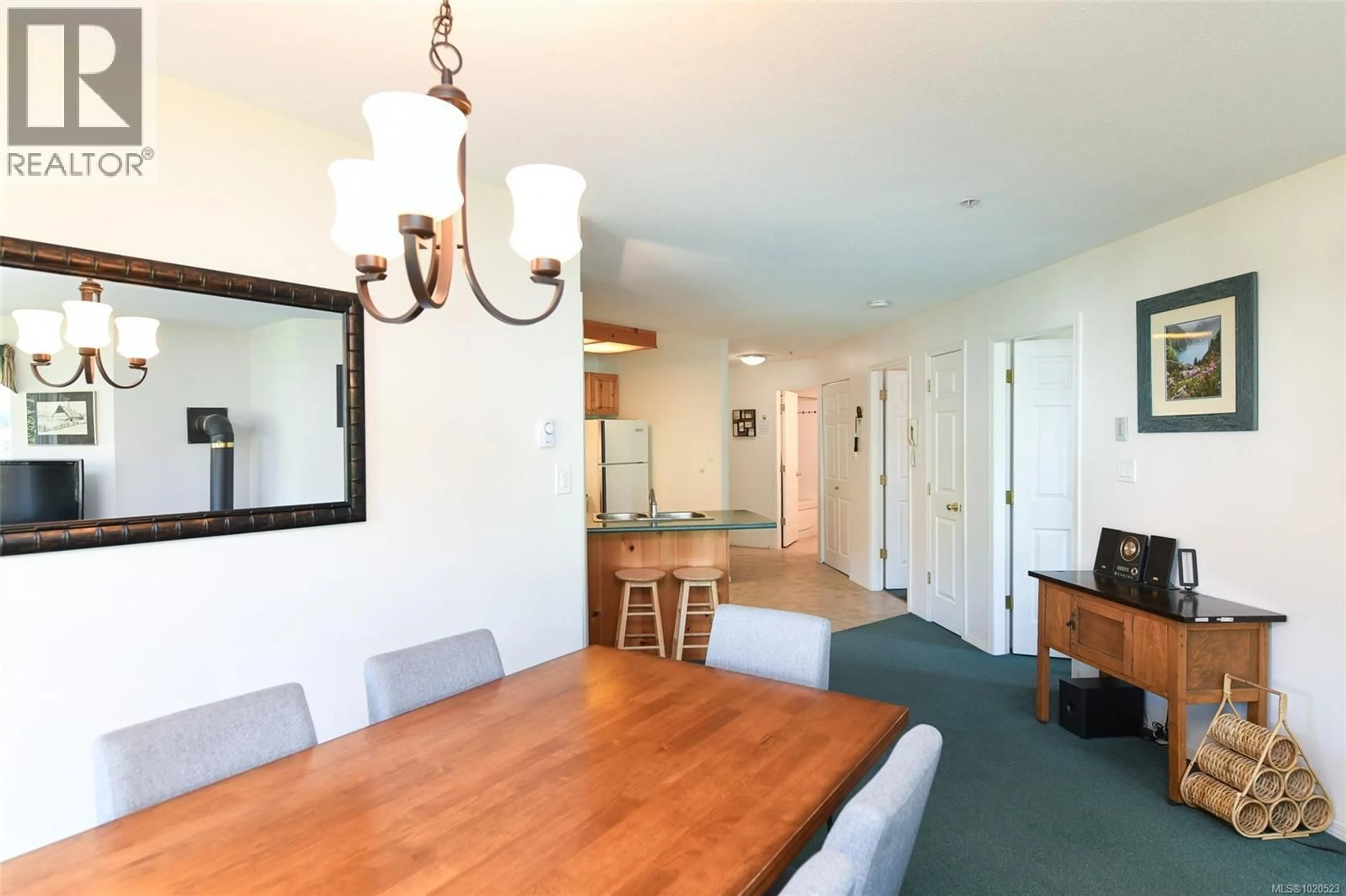 Dining room, wood/laminate floor for 217 - 1320 HENRY ROAD, Courtenay British Columbia V9J1L0