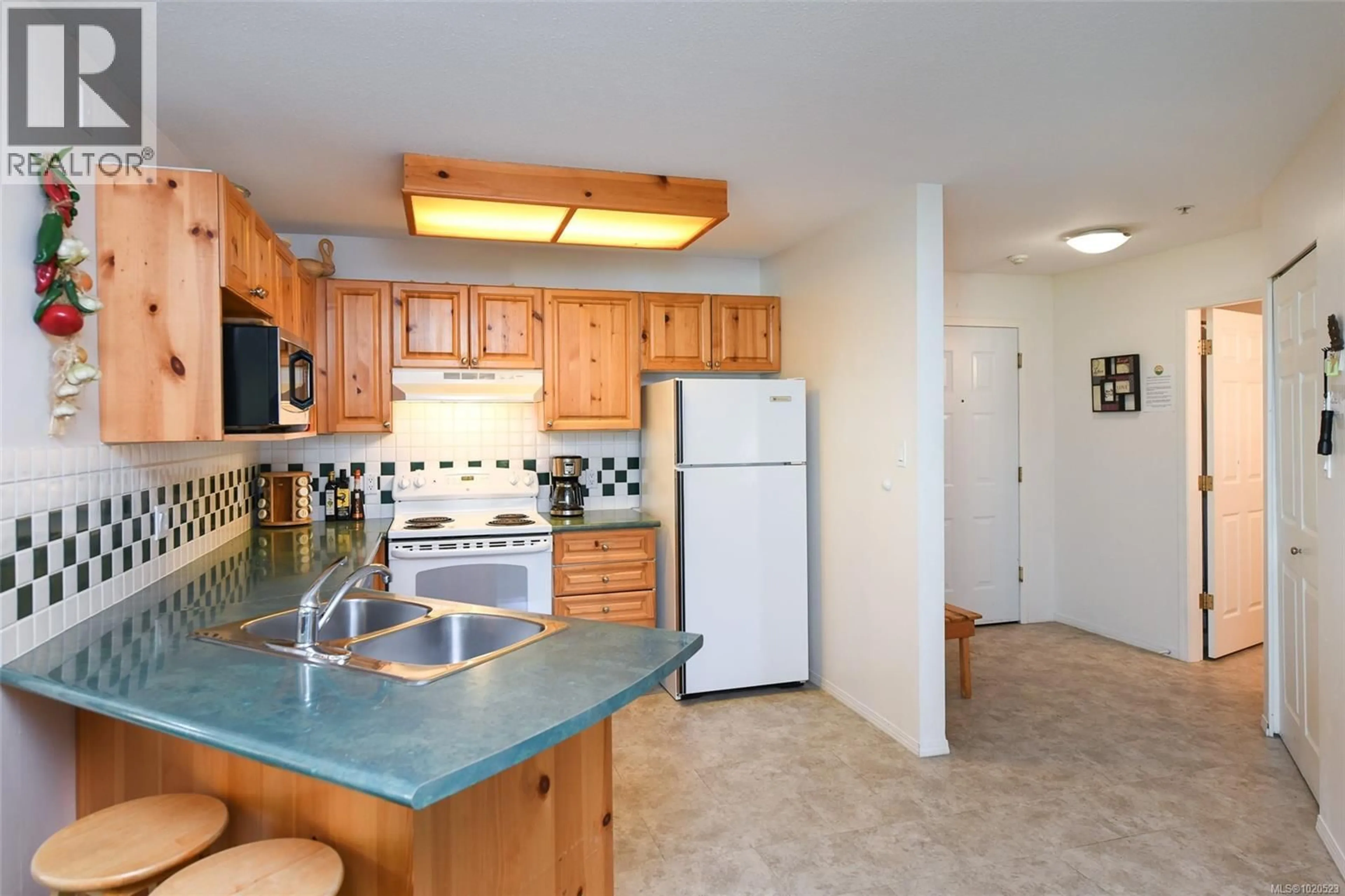 Standard kitchen, ceramic/tile floor for 217 - 1320 HENRY ROAD, Courtenay British Columbia V9J1L0