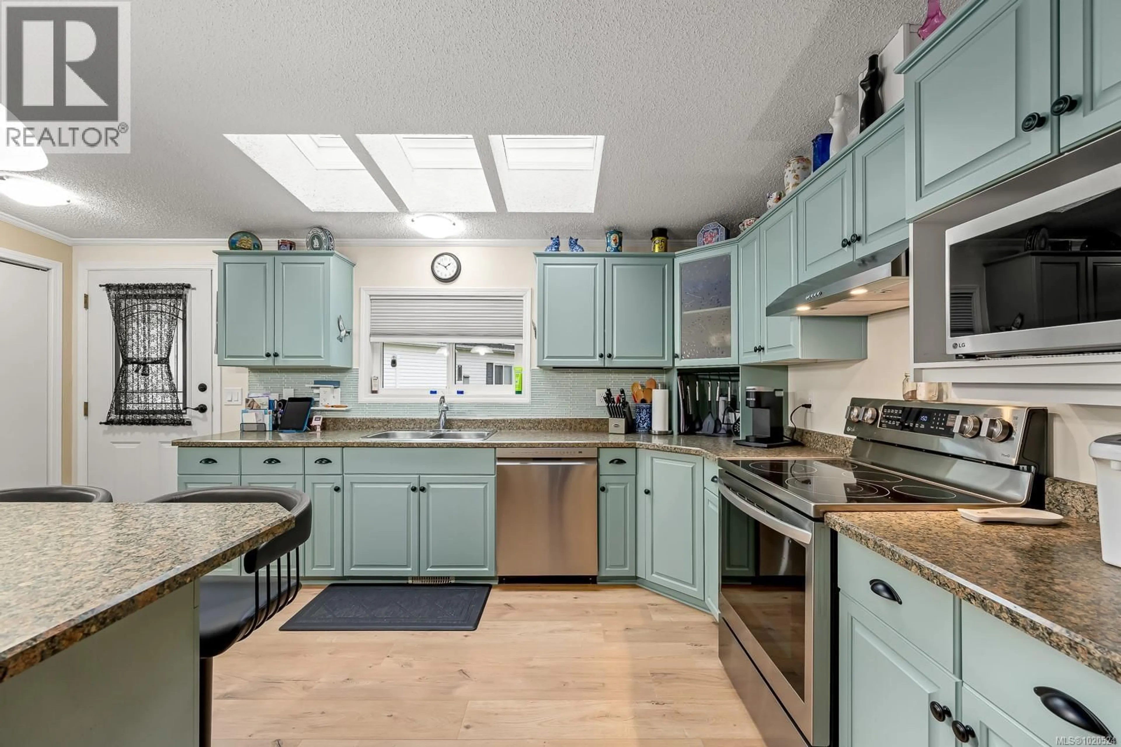 Open concept kitchen, ceramic/tile floor for 114 - 4714 MUIR ROAD, Courtenay British Columbia V9N8Z6