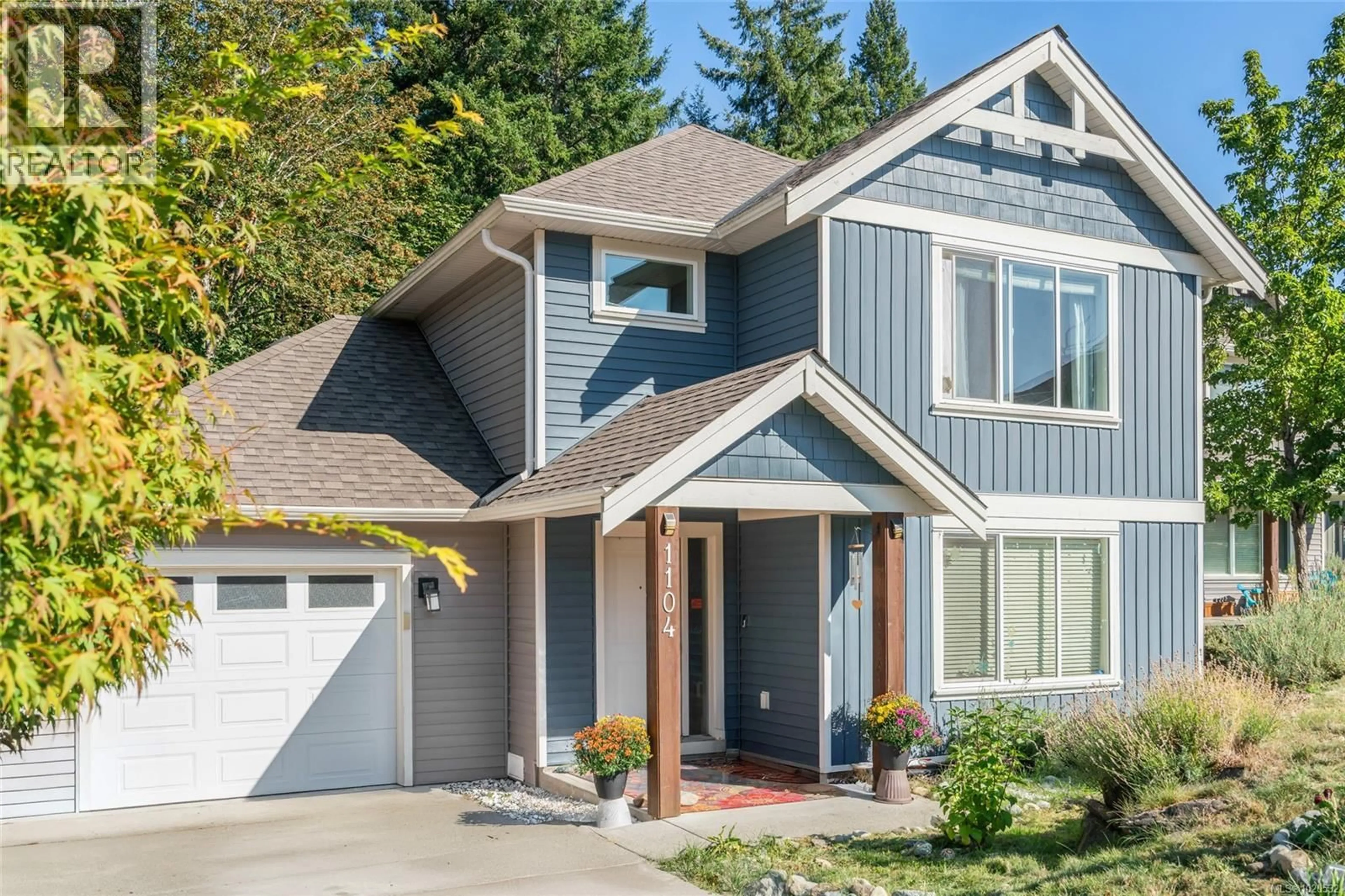 Home with vinyl exterior material, street for 1104 TIMBERWOOD DRIVE, Nanaimo British Columbia V9R0H2