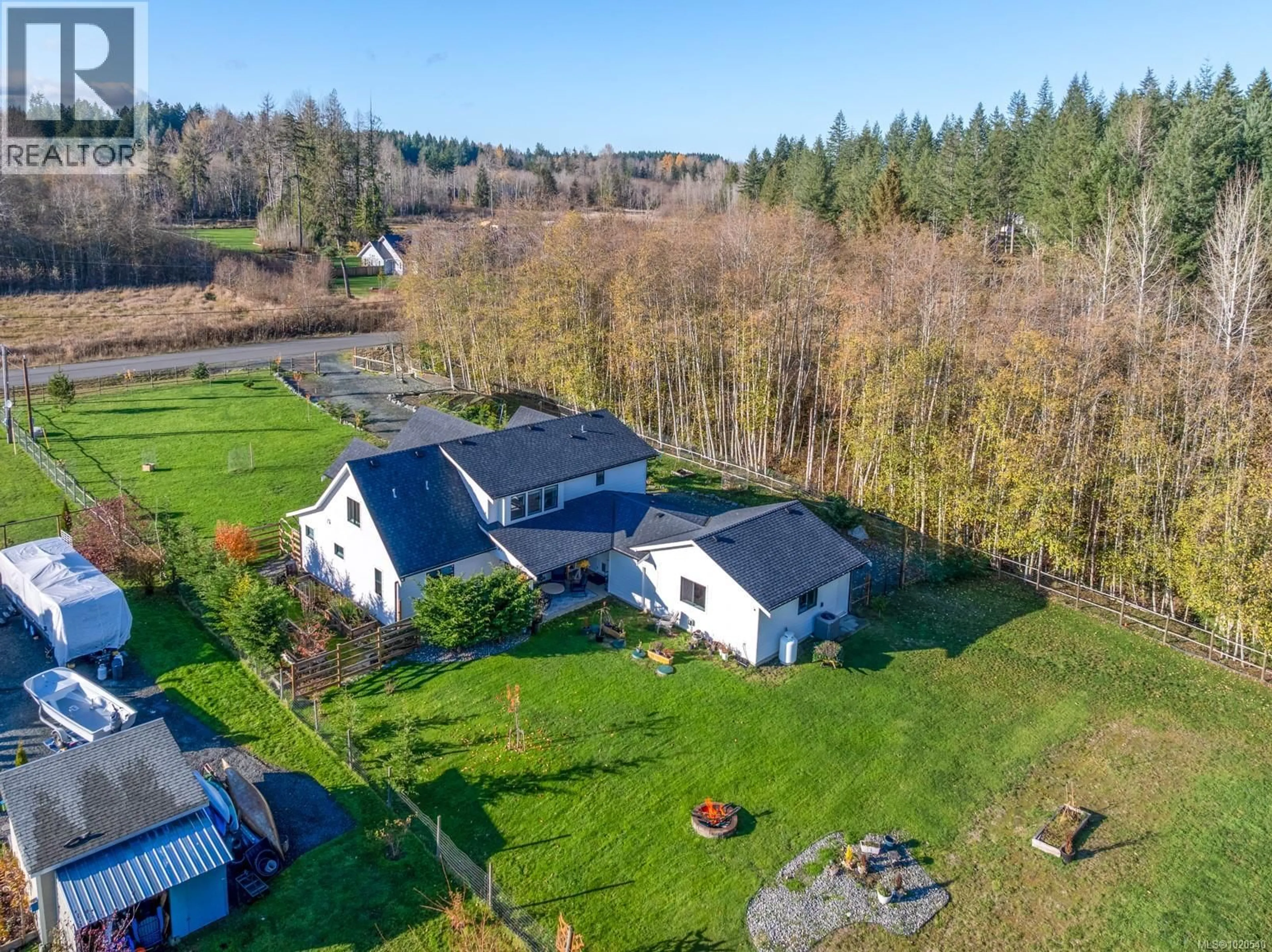 A pic from outside/outdoor area/front of a property/back of a property/a pic from drone, water/lake/river/ocean view for 8740 OYSTER RIVER WAY, Black Creek British Columbia V9J1K3