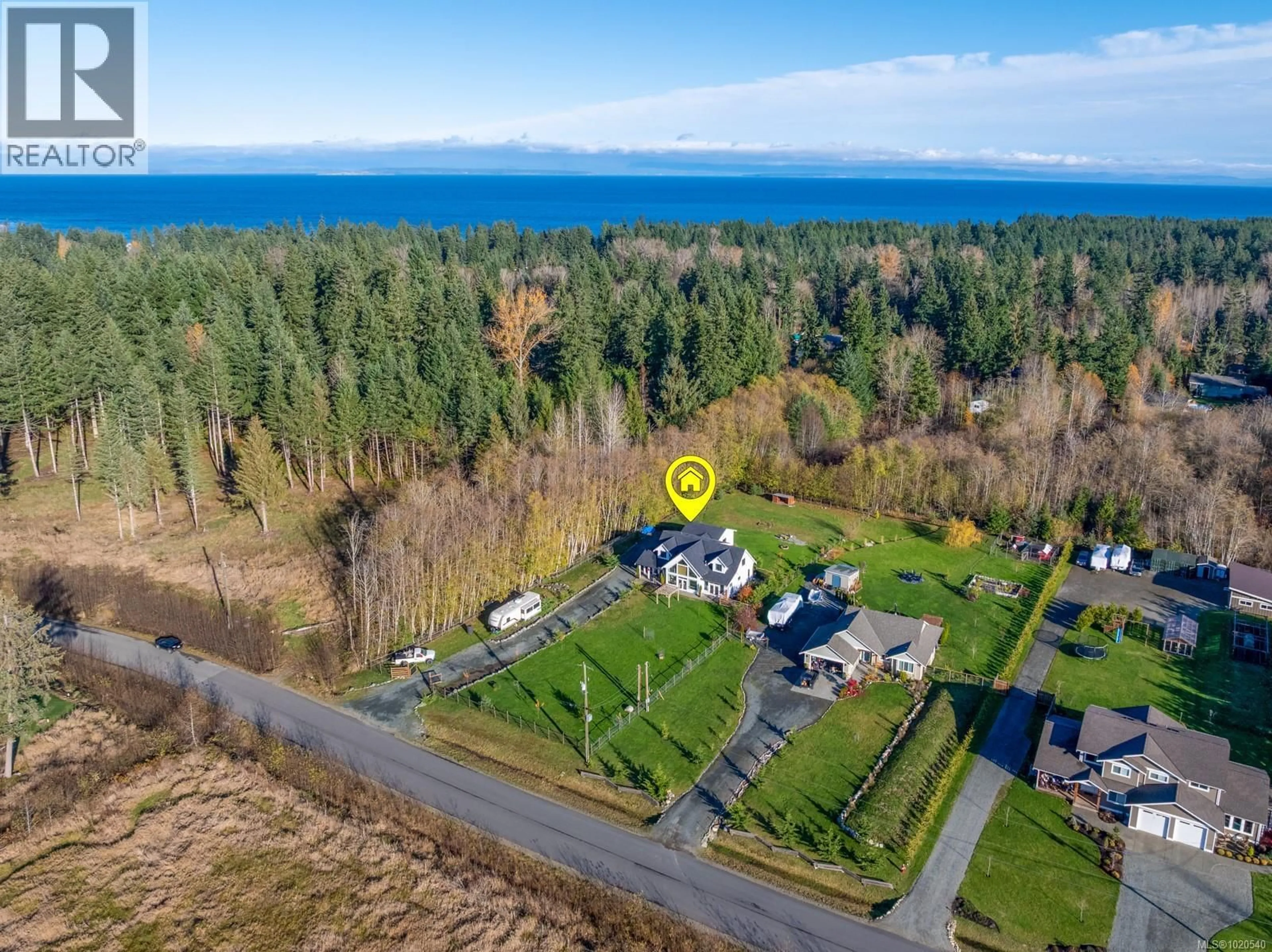 A pic from outside/outdoor area/front of a property/back of a property/a pic from drone, water/lake/river/ocean view for 8740 OYSTER RIVER WAY, Black Creek British Columbia V9J1K3