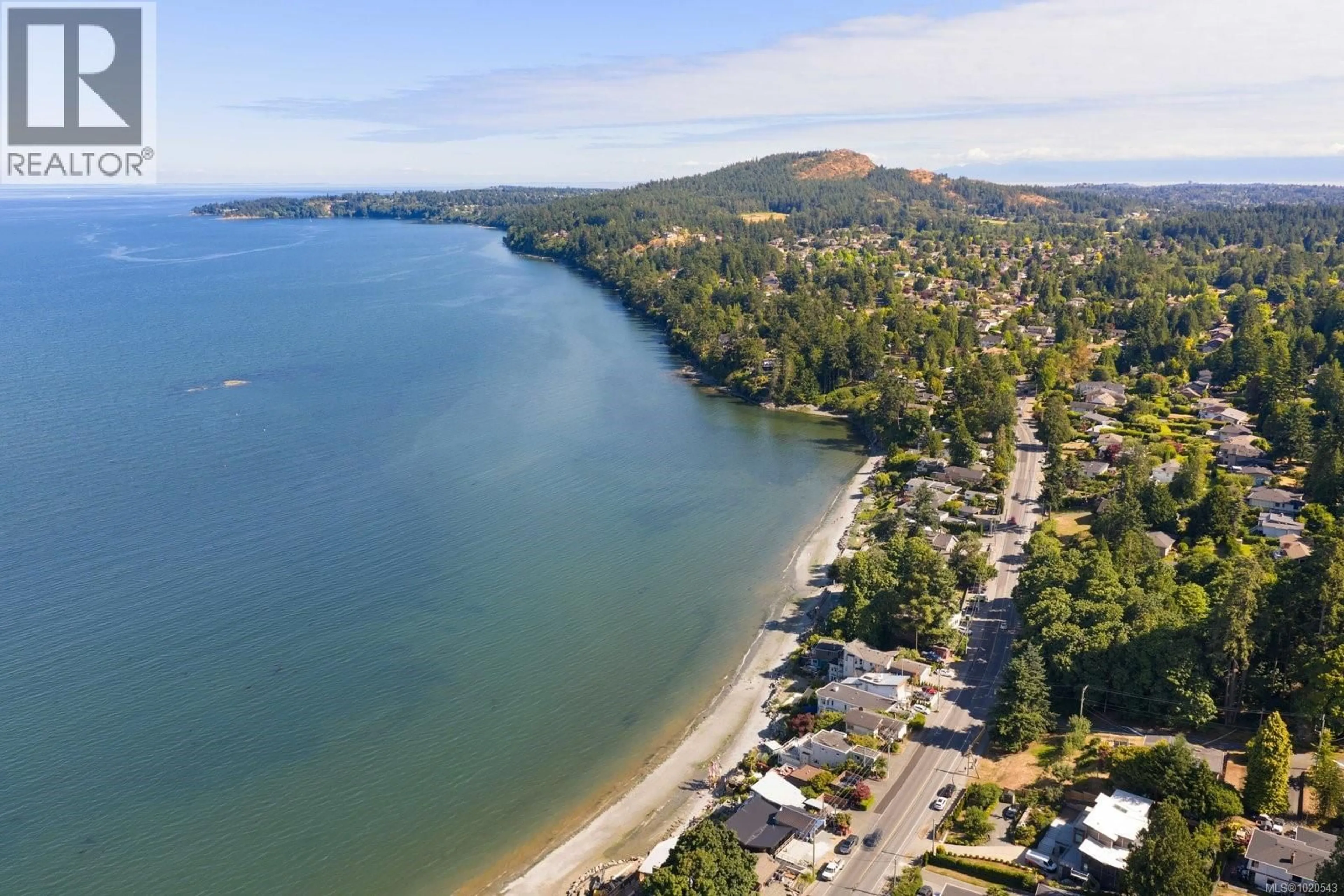 A pic from outside/outdoor area/front of a property/back of a property/a pic from drone, water/lake/river/ocean view for 5015 CORDOVA BAY ROAD, Saanich British Columbia V8Y2K1