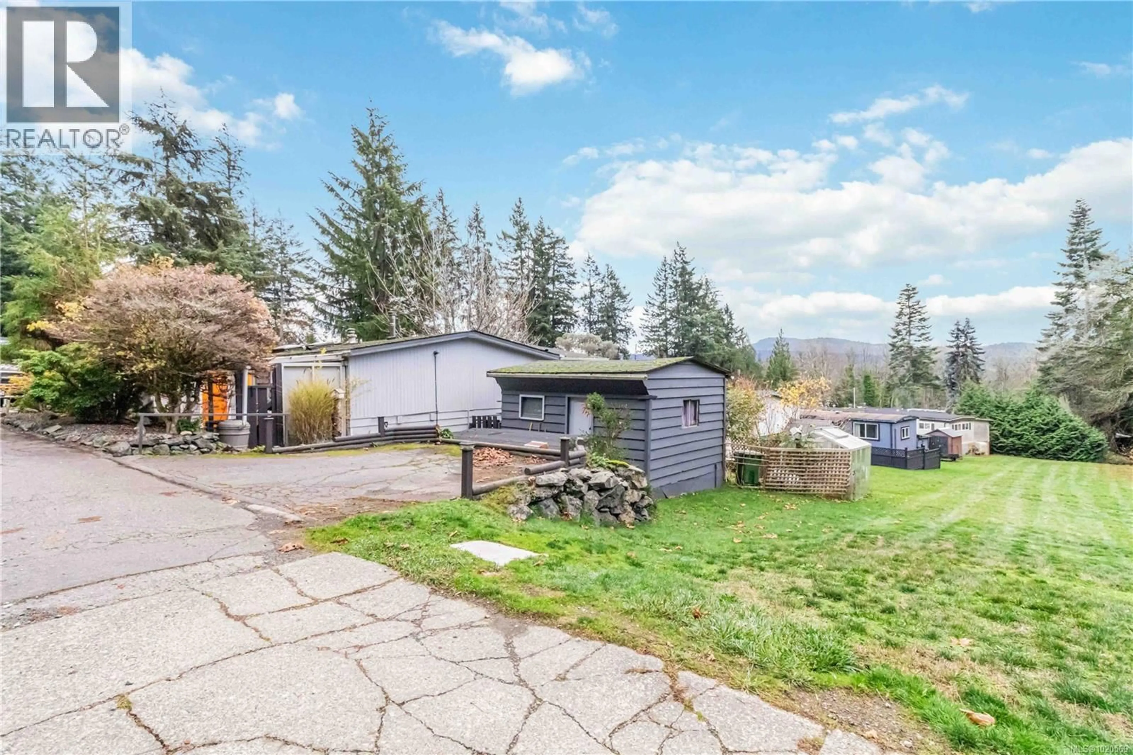 A pic from outside/outdoor area/front of a property/back of a property/a pic from drone, street for 4 - 5838 BLYTHWOOD ROAD, Sooke British Columbia V9Z0G2