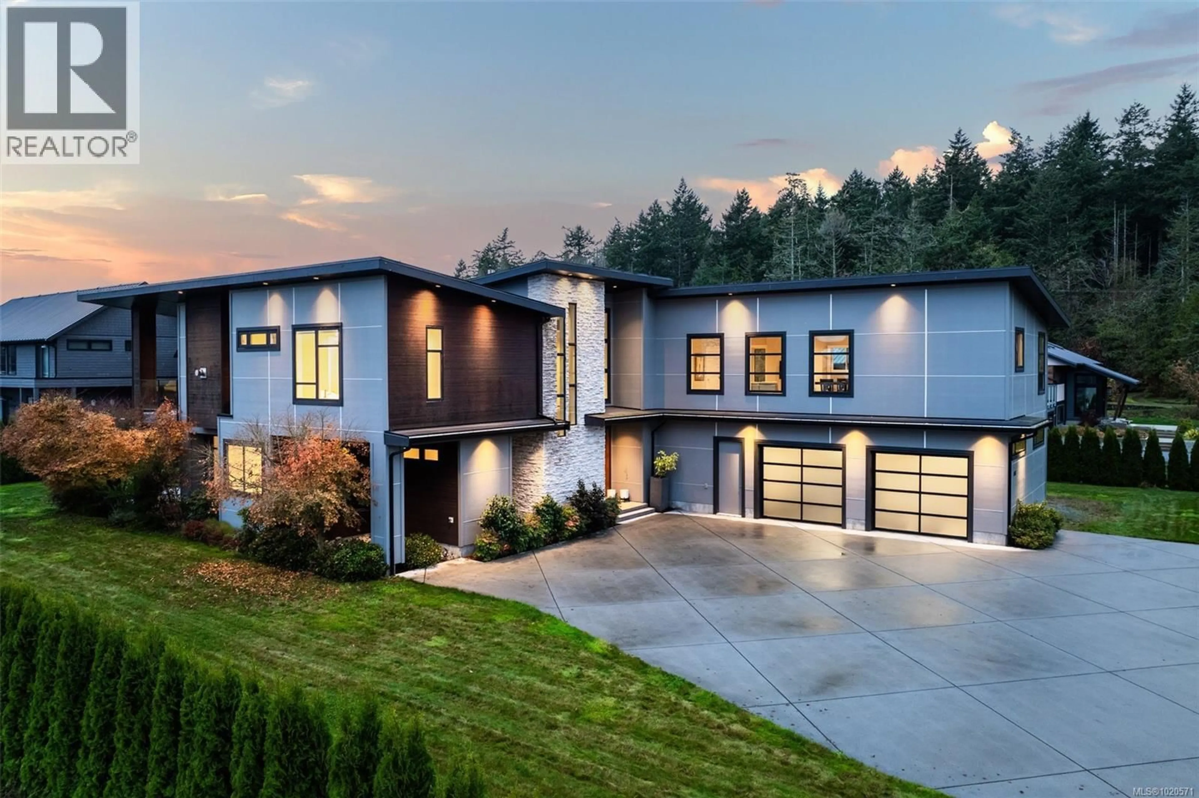 Home with brick exterior material, mountain view for 1857 MCMICKEN ROAD, North Saanich British Columbia V8L5S5