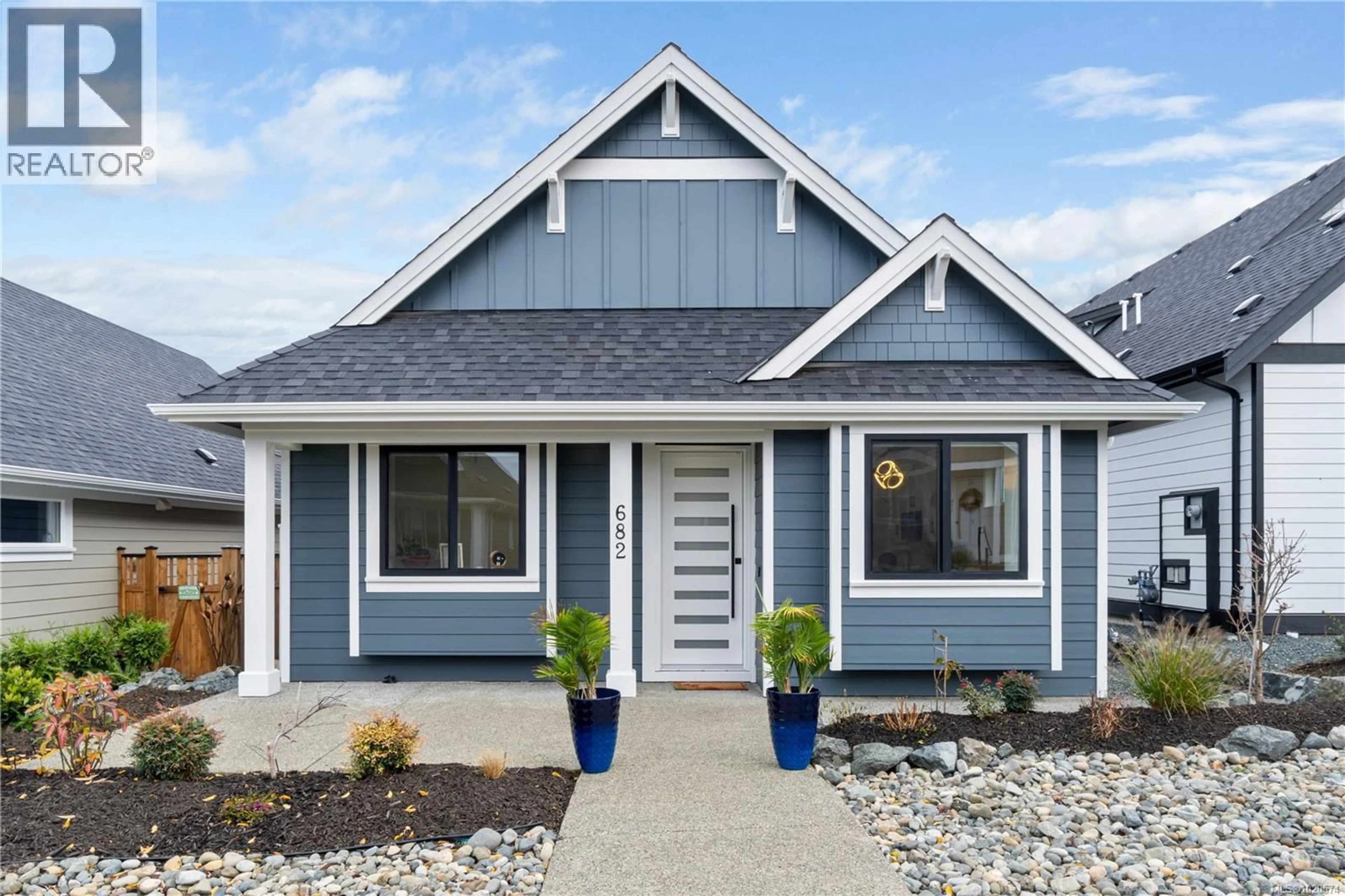 Home with vinyl exterior material, street for 682 BRIARWOOD DRIVE, Parksville British Columbia V9P0G5