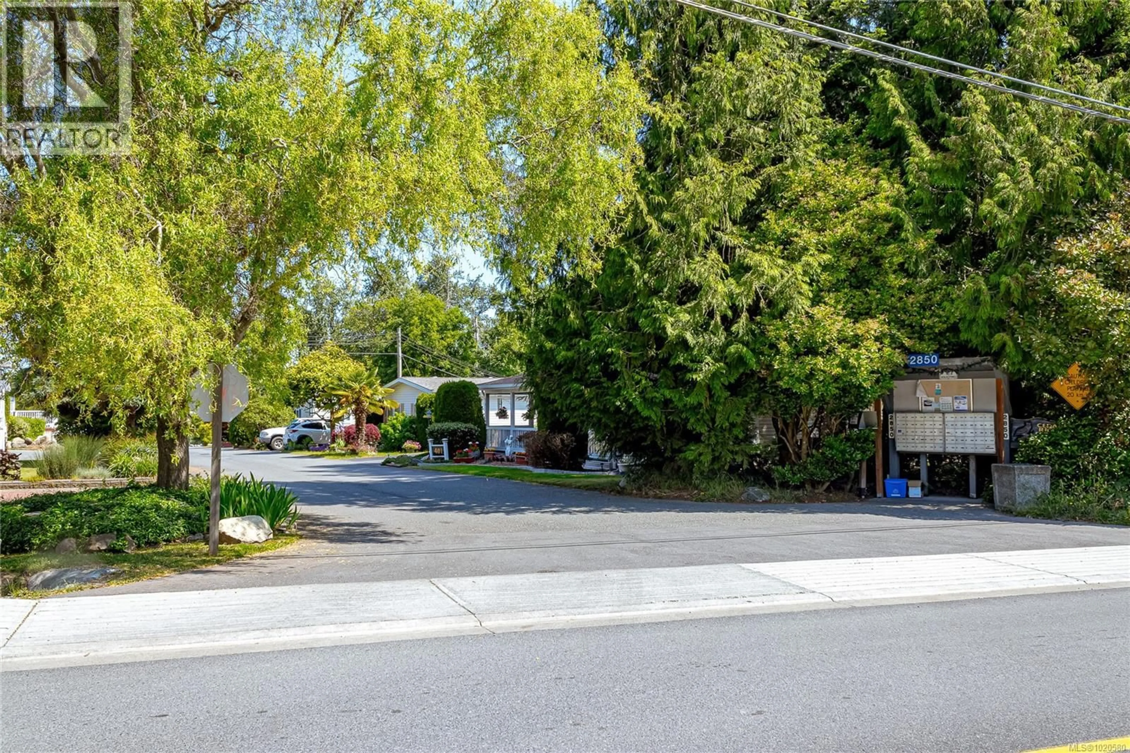 A pic from outside/outdoor area/front of a property/back of a property/a pic from drone, street for 410 - 2850 STAUTW ROAD, Central Saanich British Columbia V8M2C9